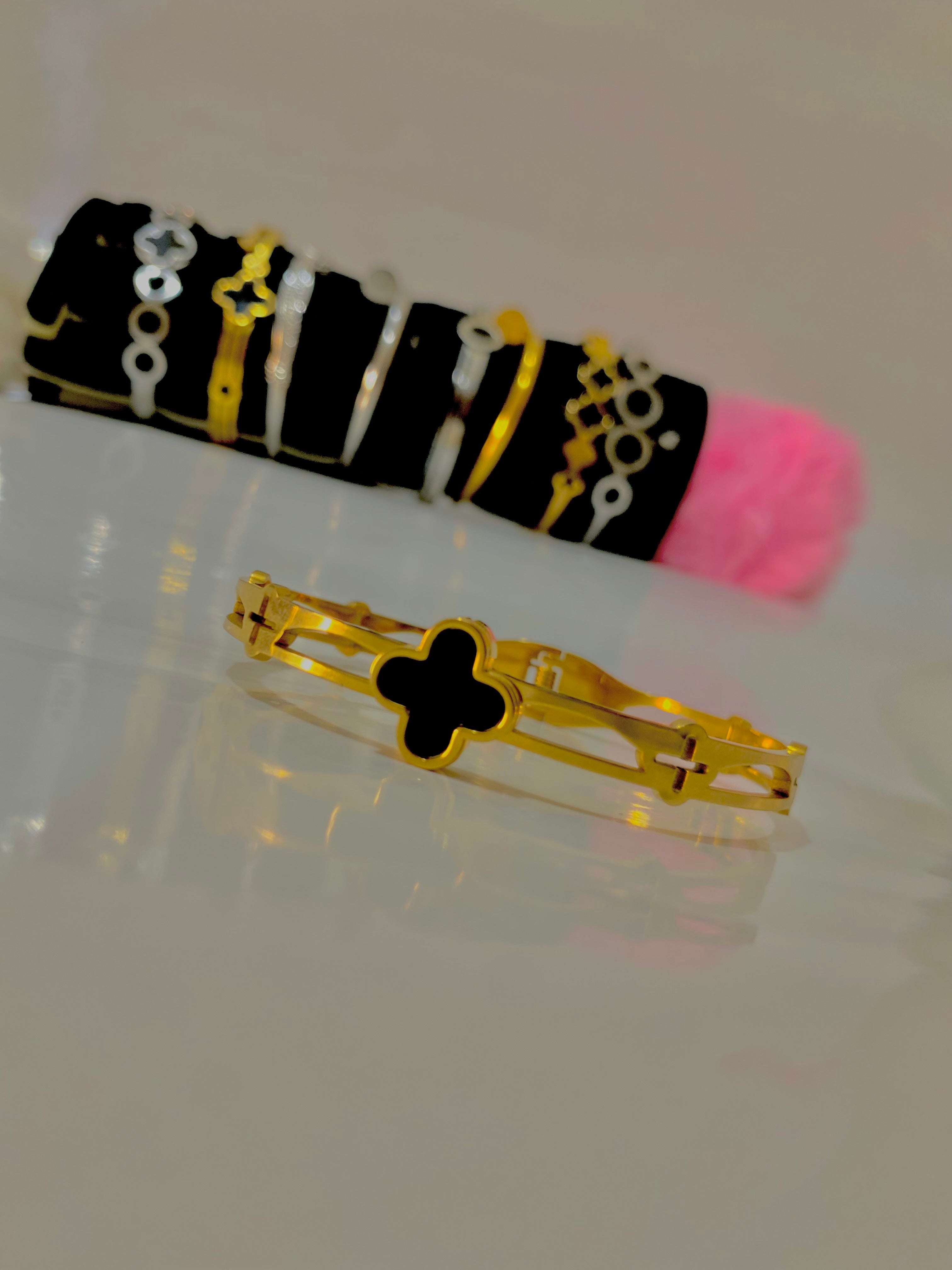 Elegant Gold Plated Bracelet with Black Clover Charm