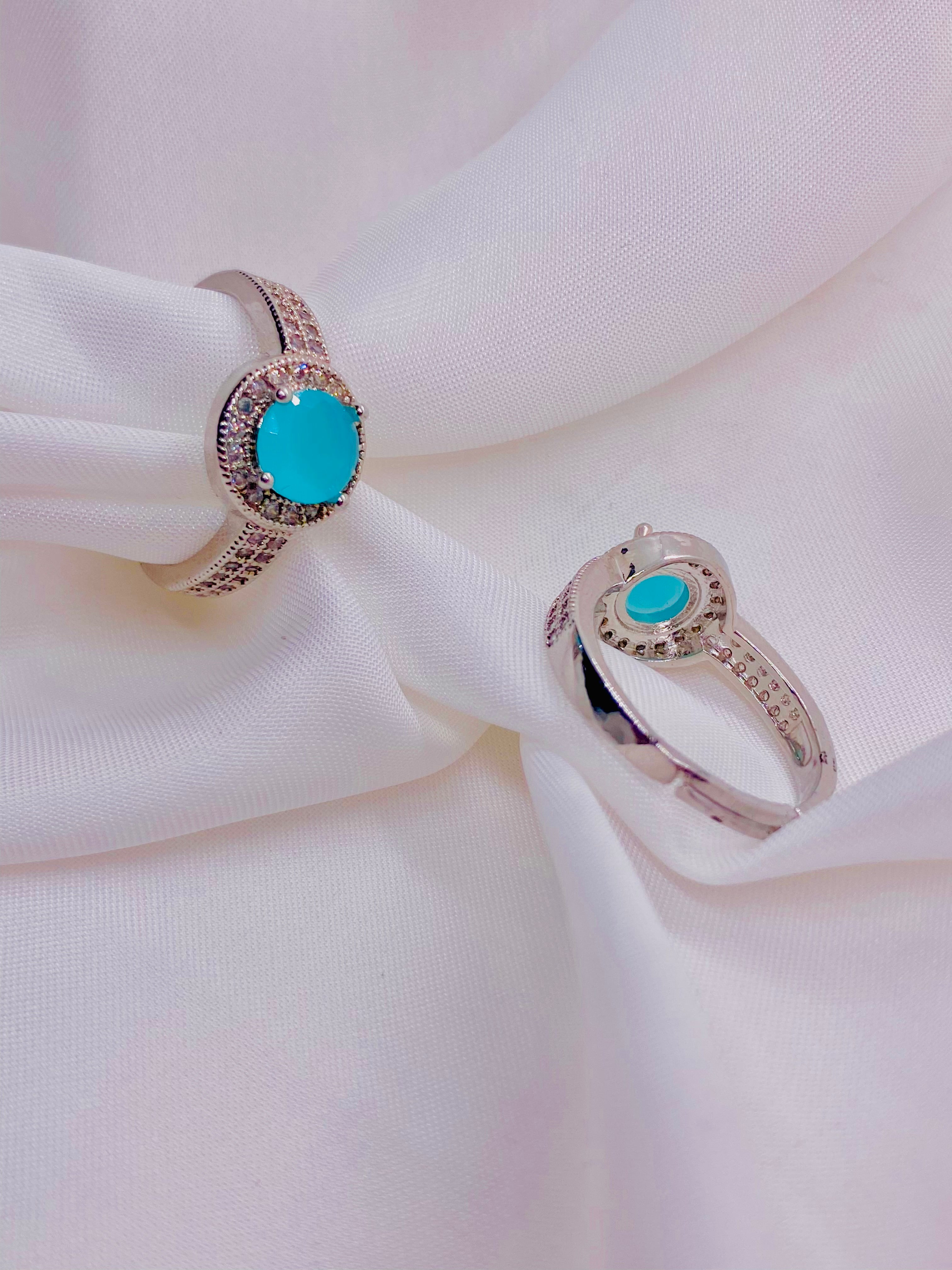 Elegant Turquoise Solitaire Halo Ring in Sterling Silver