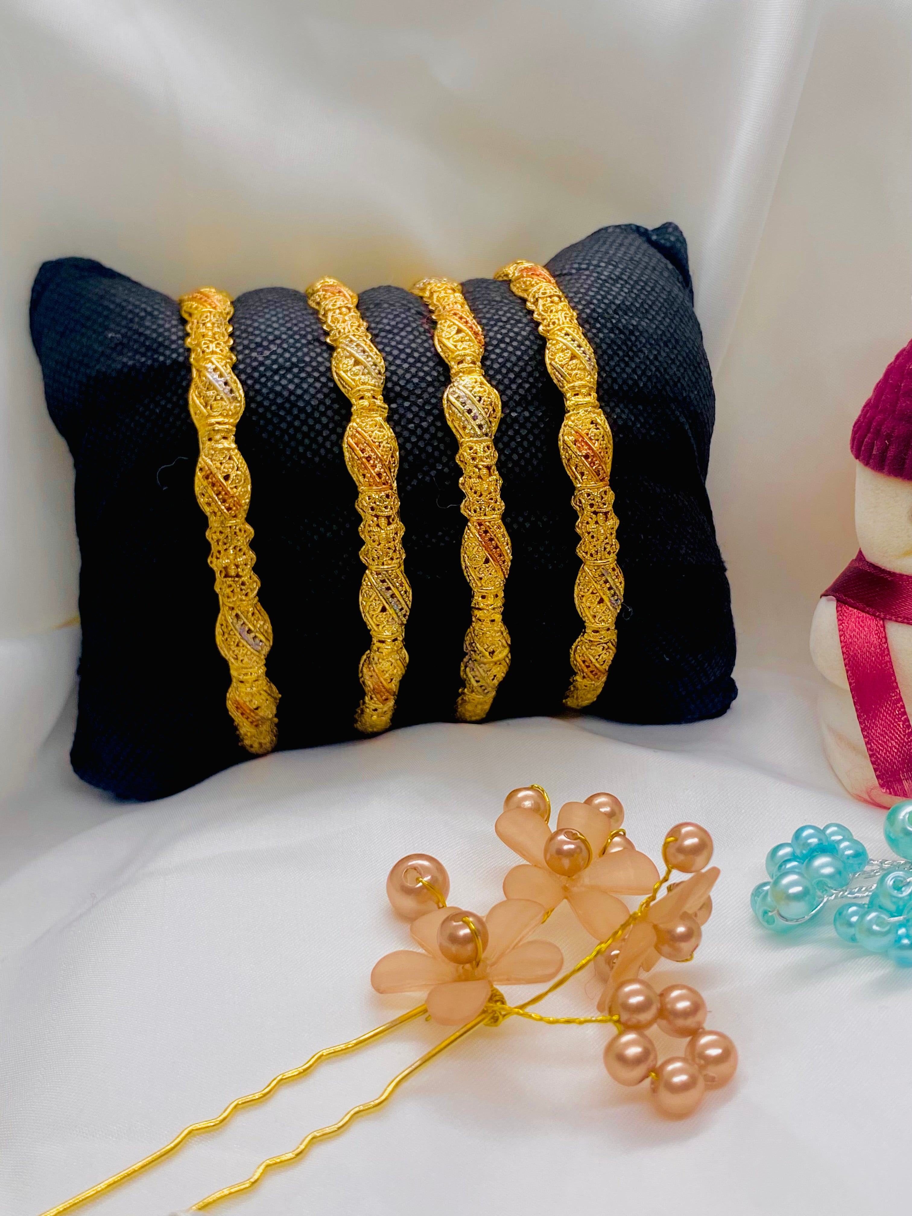Gold-Plated Bangles with Dual-Tone Detailing – Set of Four