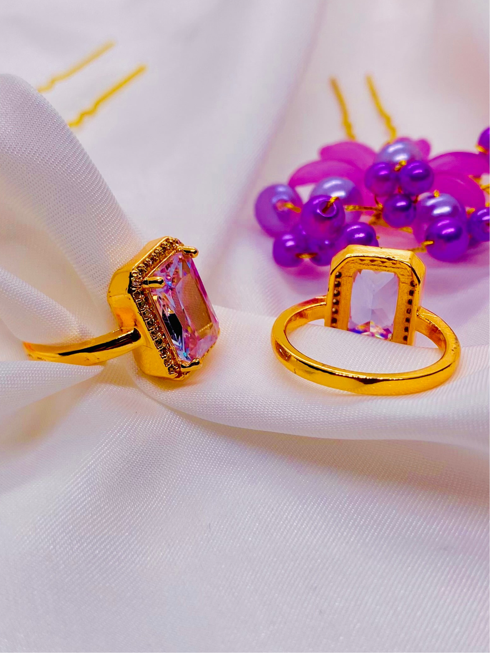 Elegant Golden Rings with Radiant Pink Gemstones