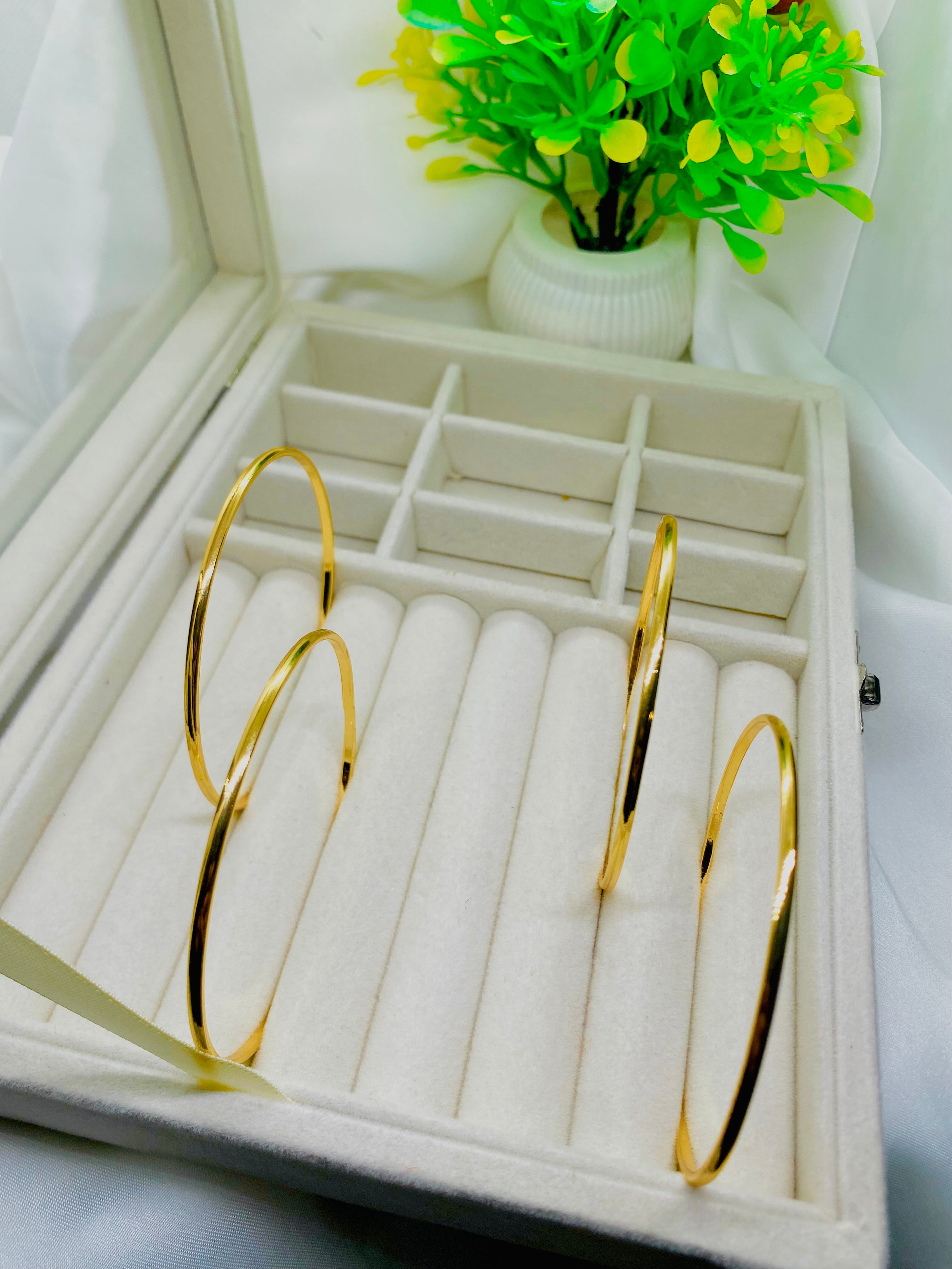 Elegant Gold-Plated Bangles – Set of 4