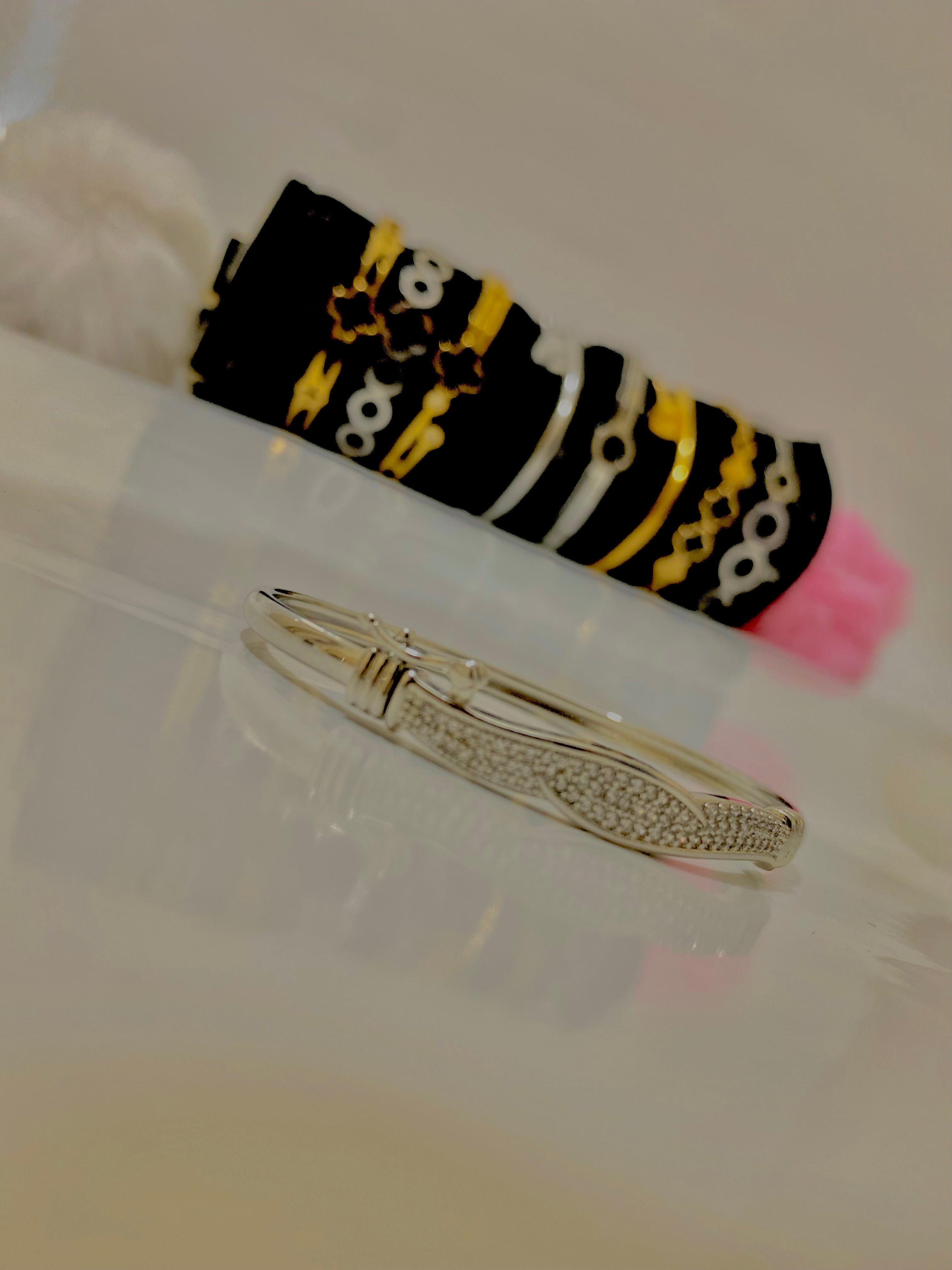Elegant Diamond-Studded Silver Bangle