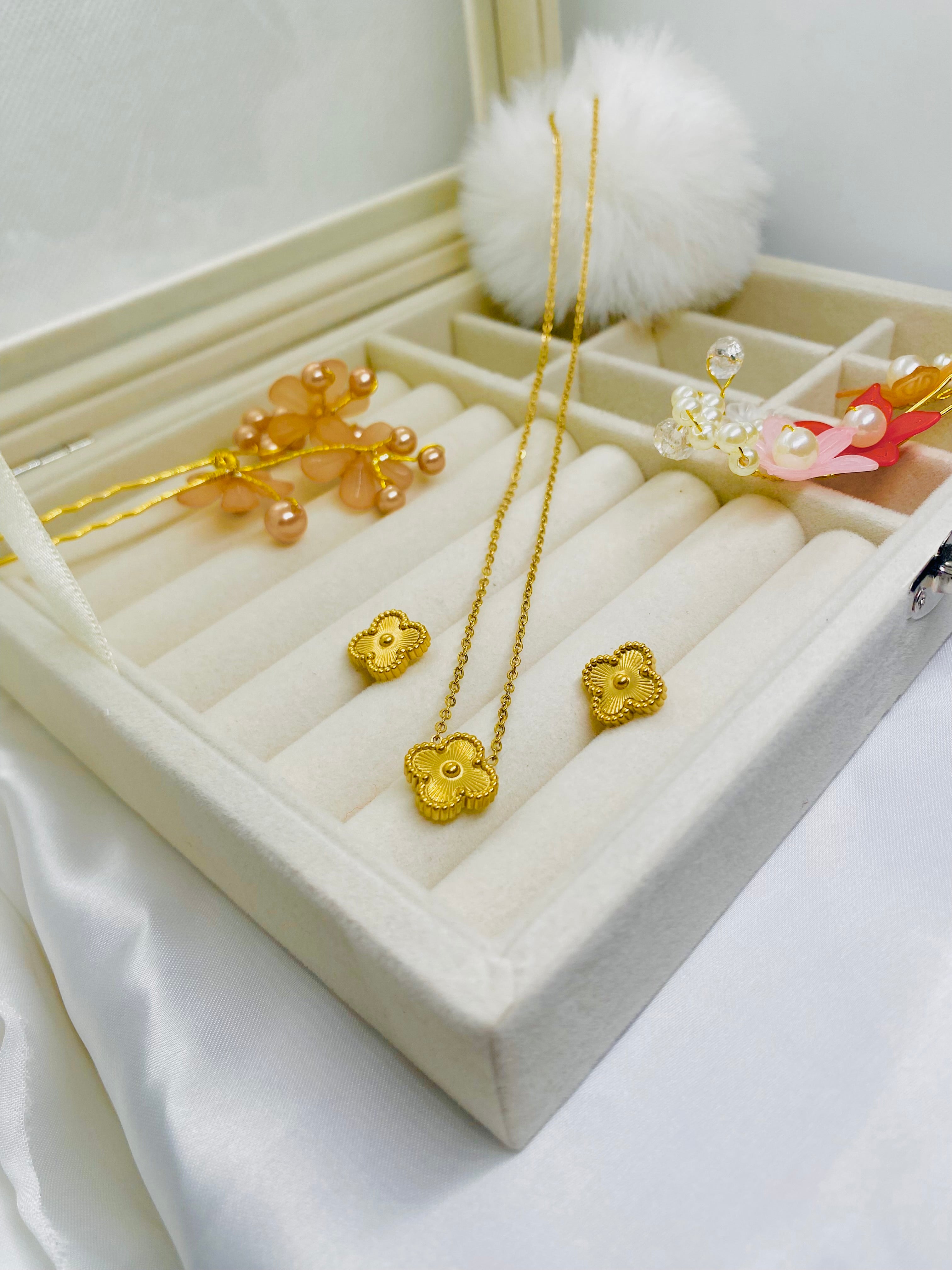 Elegant Floral-Inspired Gold Pendant and Earring Set