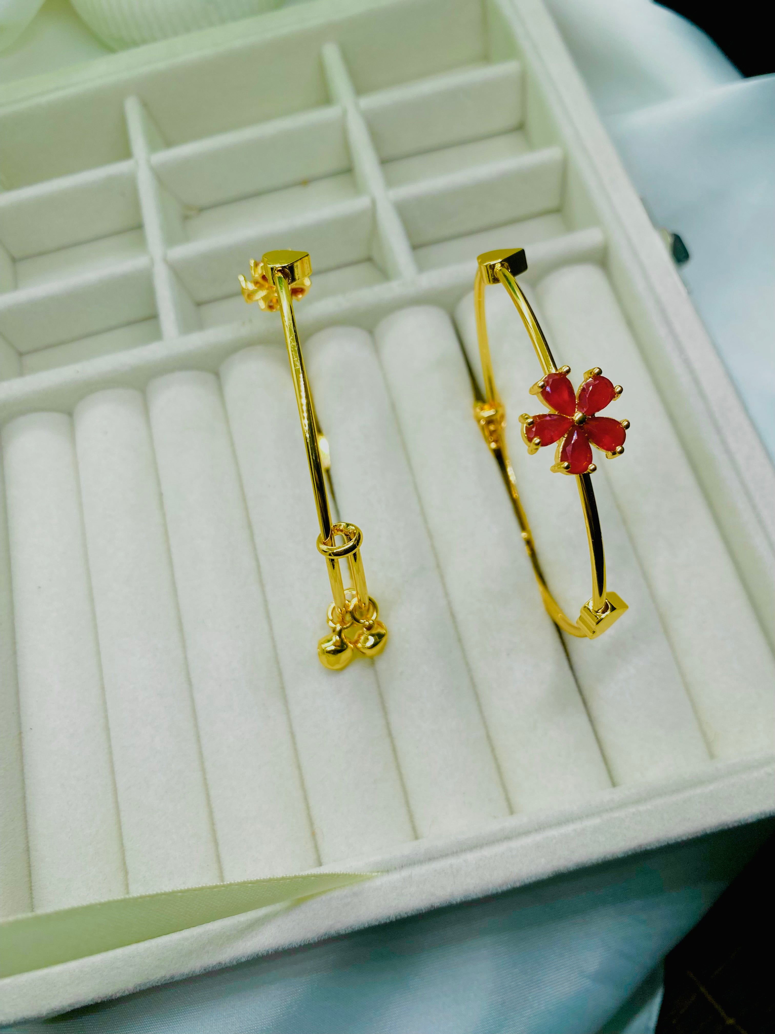 Elegant Gold-Plated Bangles with Red Floral and Charm Accents