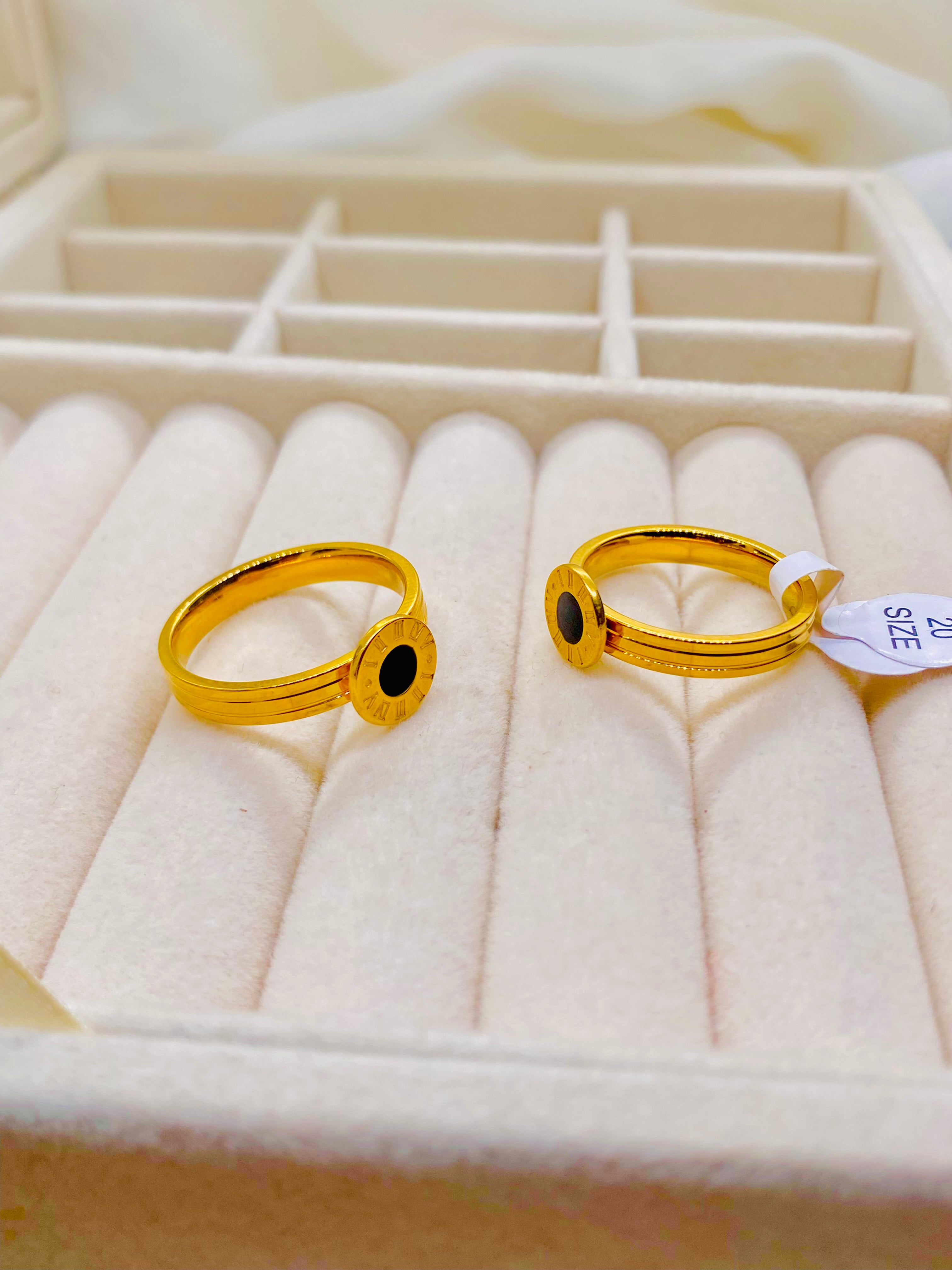 Elegant Gold Roman Numeral Rings with Black Enamel Center