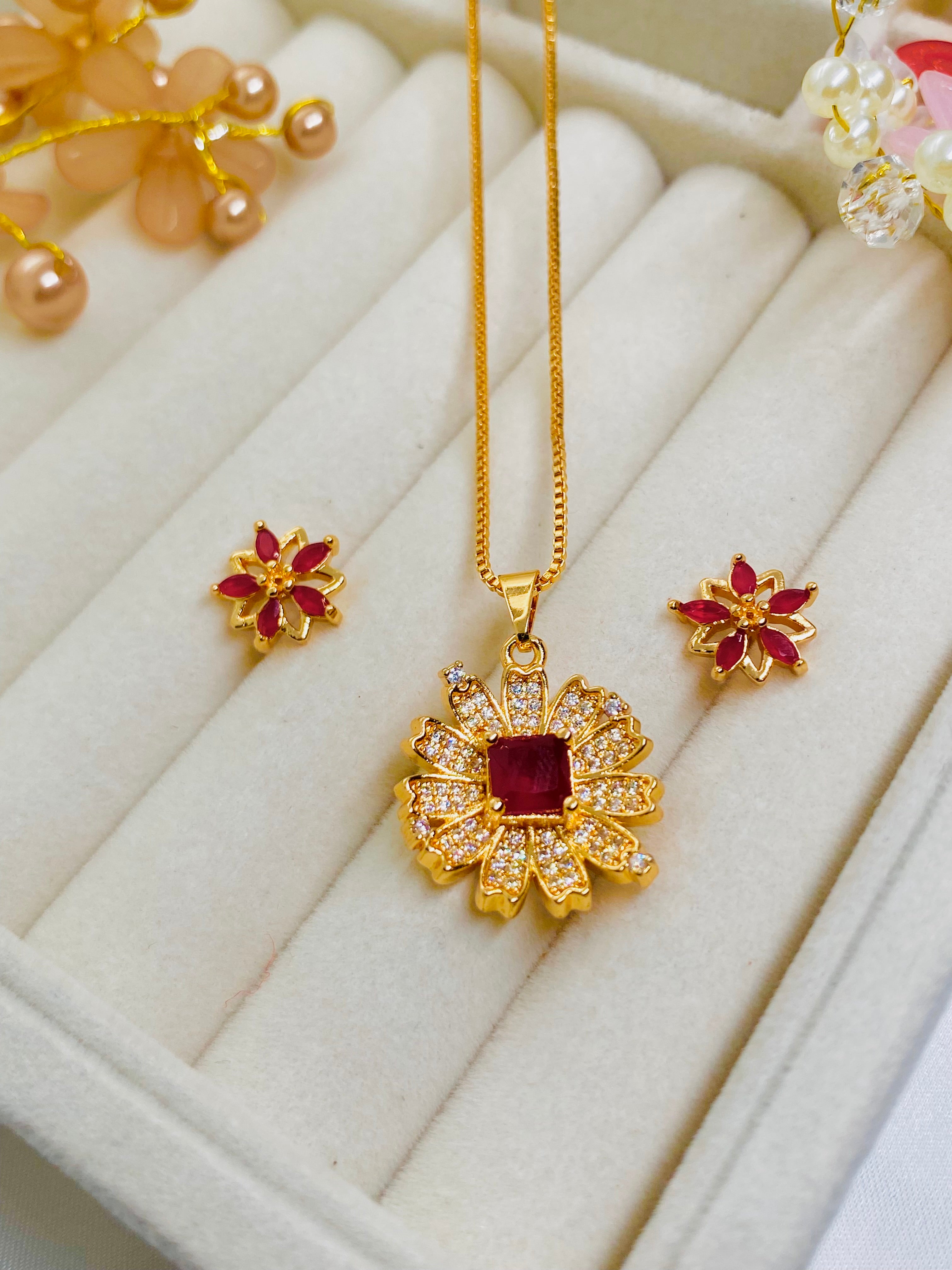 Elegant Gold-Plated Floral Pendant Set with Ruby Red Stones
