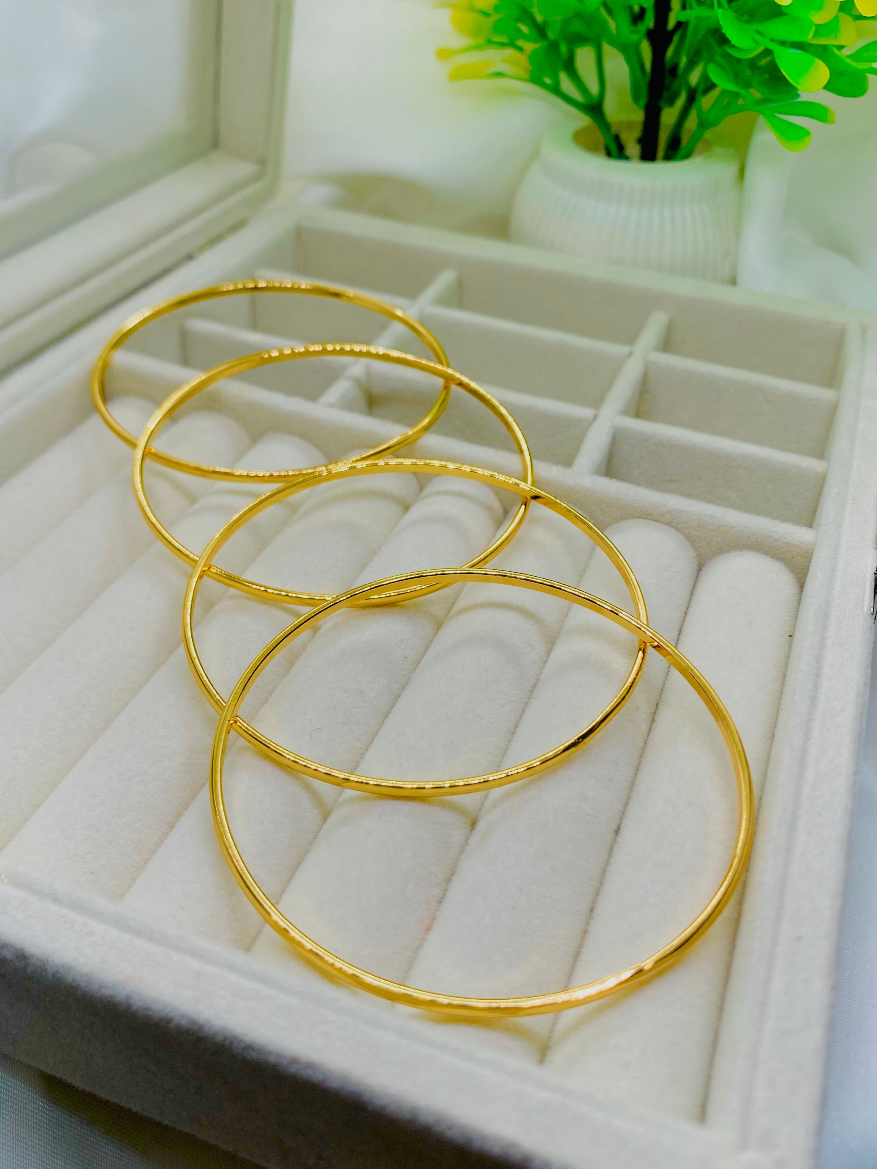Elegant Gold-Plated Bangles – Set of 4