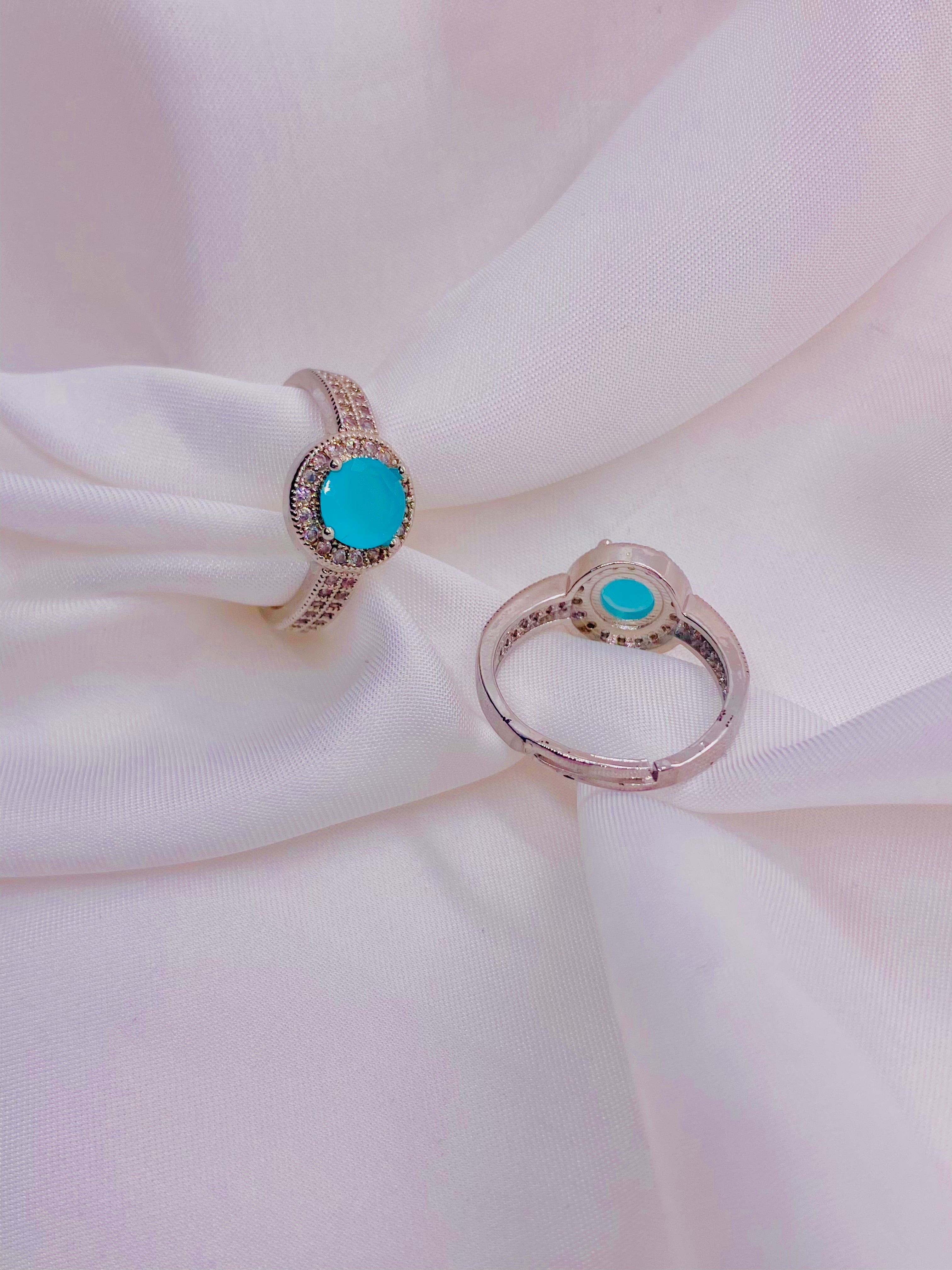 Elegant Turquoise Solitaire Halo Ring in Sterling Silver
