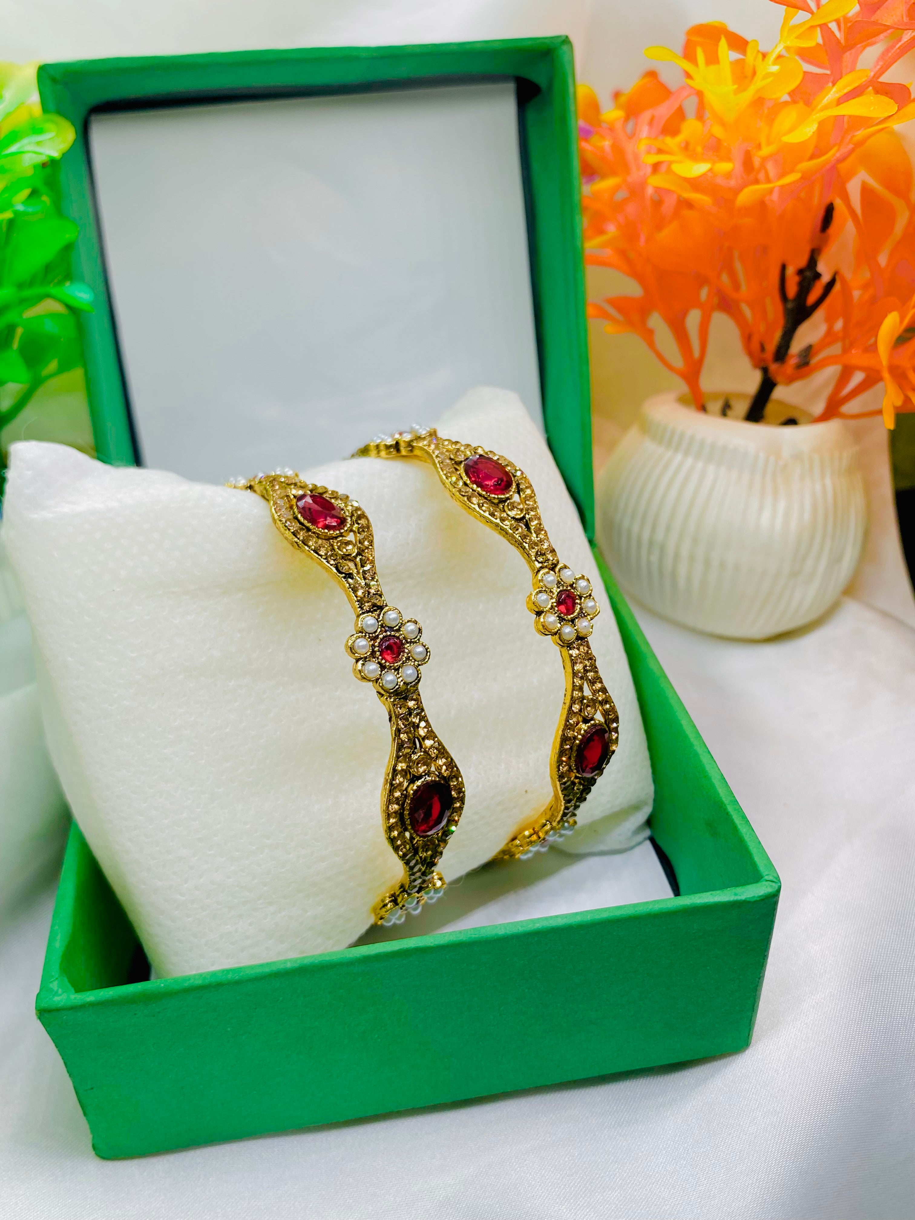 Elegant Gold-Plated Ruby Bangles with Pearl Floral Accents