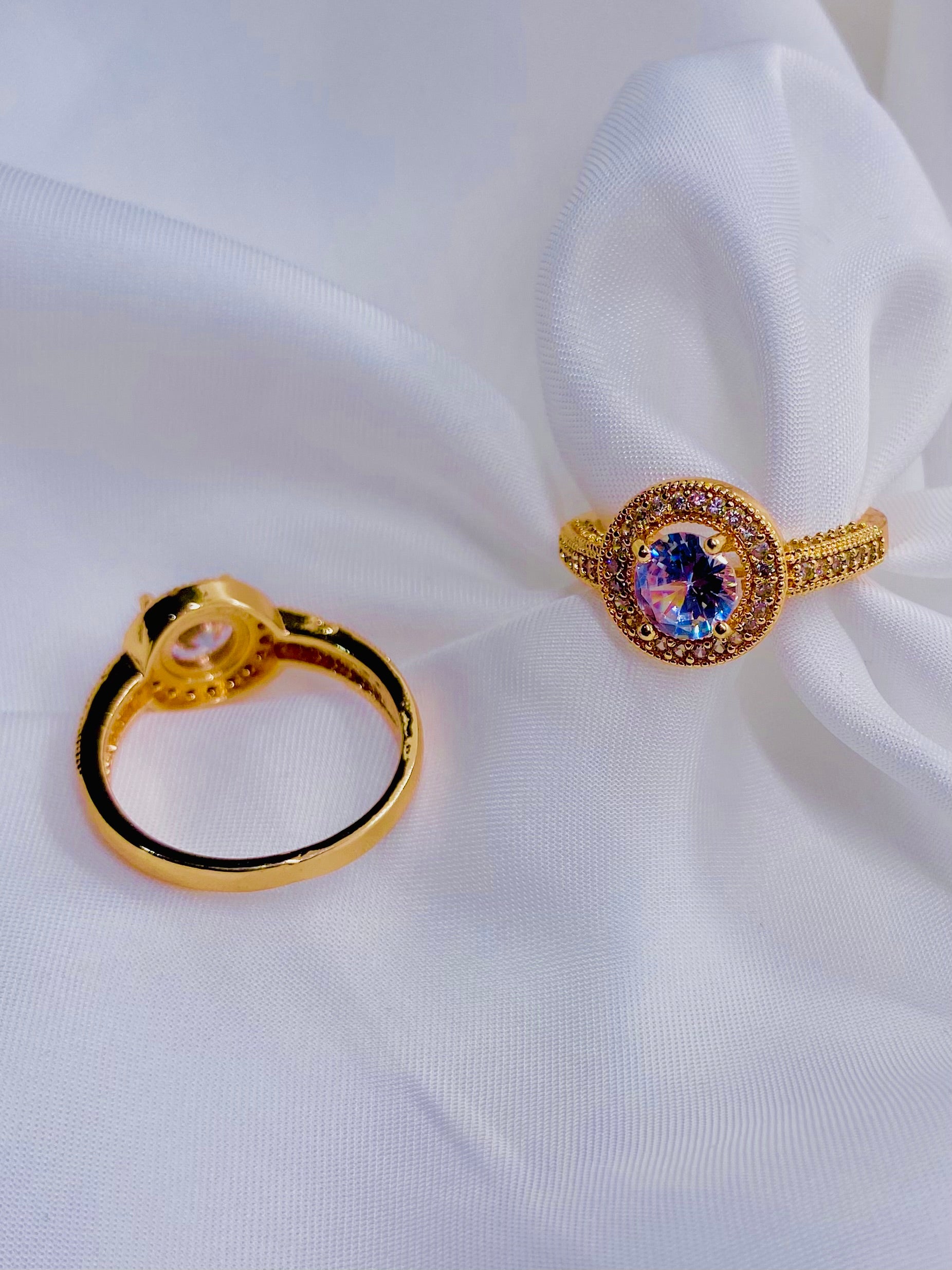 Vintage-Inspired Gold Rings with Iridescent Center Stones