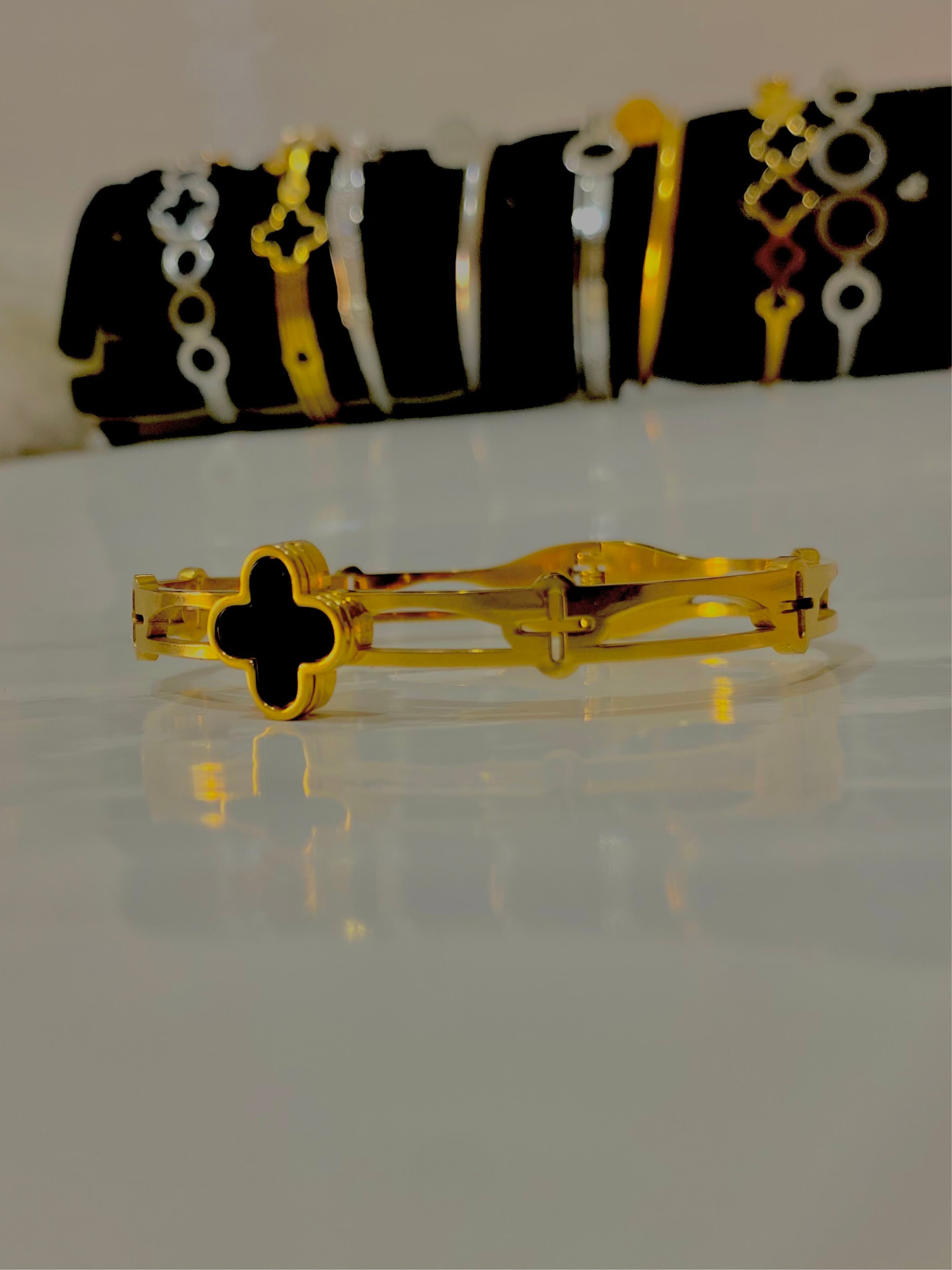 Elegant Gold Plated Bracelet with Black Clover Charm