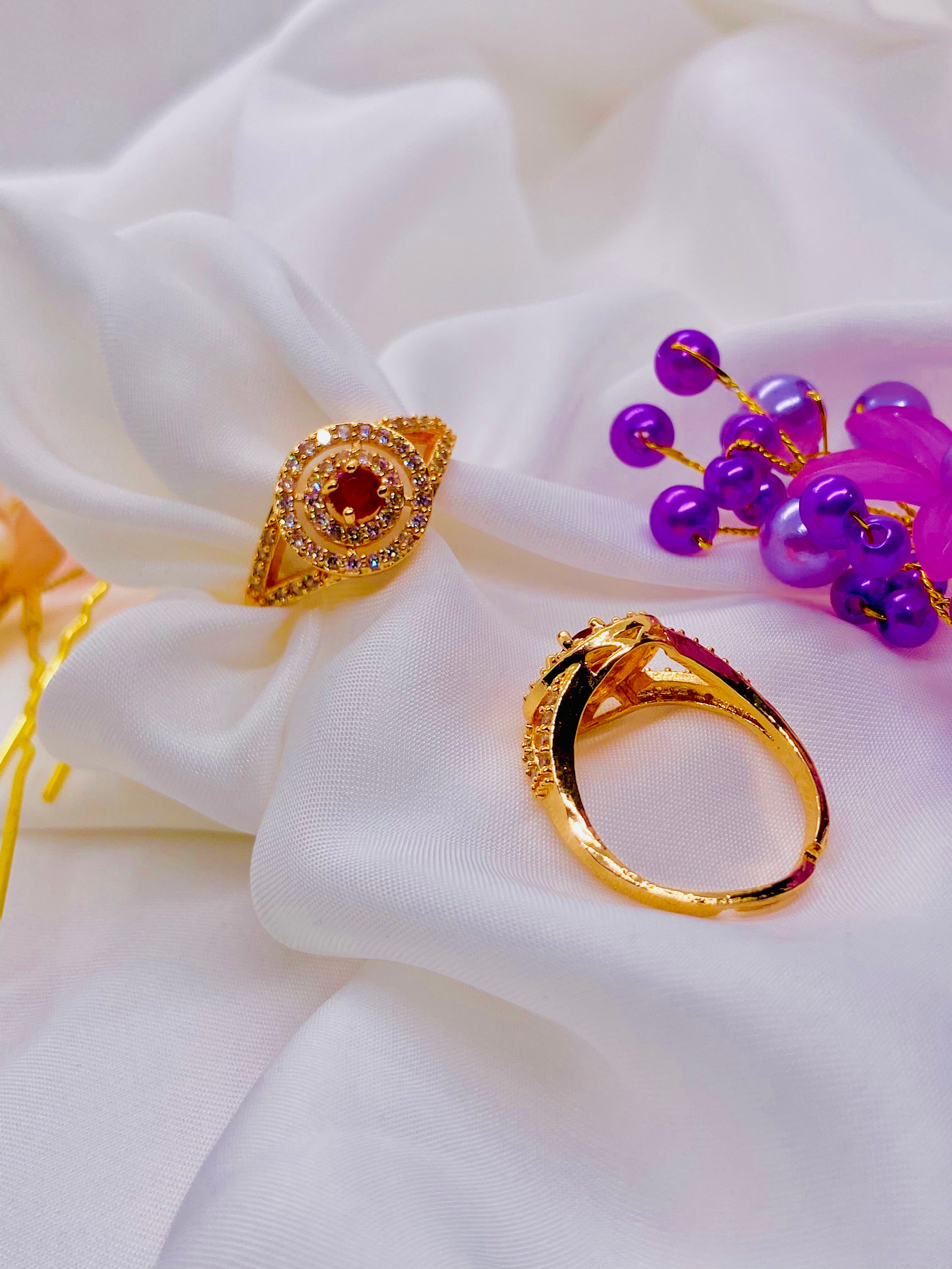 Royal Radiance: Ruby Halo Gold Ring