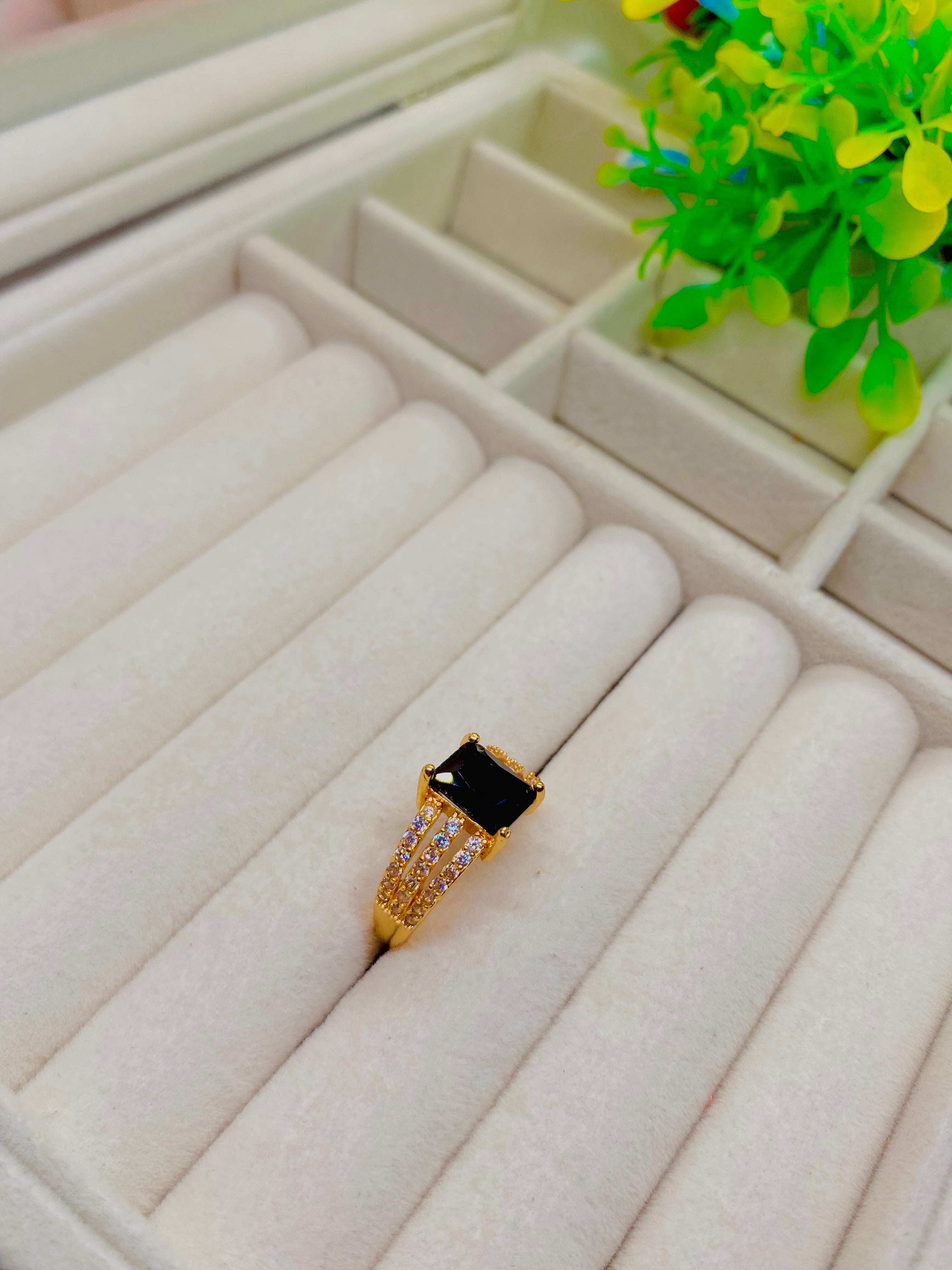 Elegant Gold-Plated Ring with Black Onyx Centerpiece
