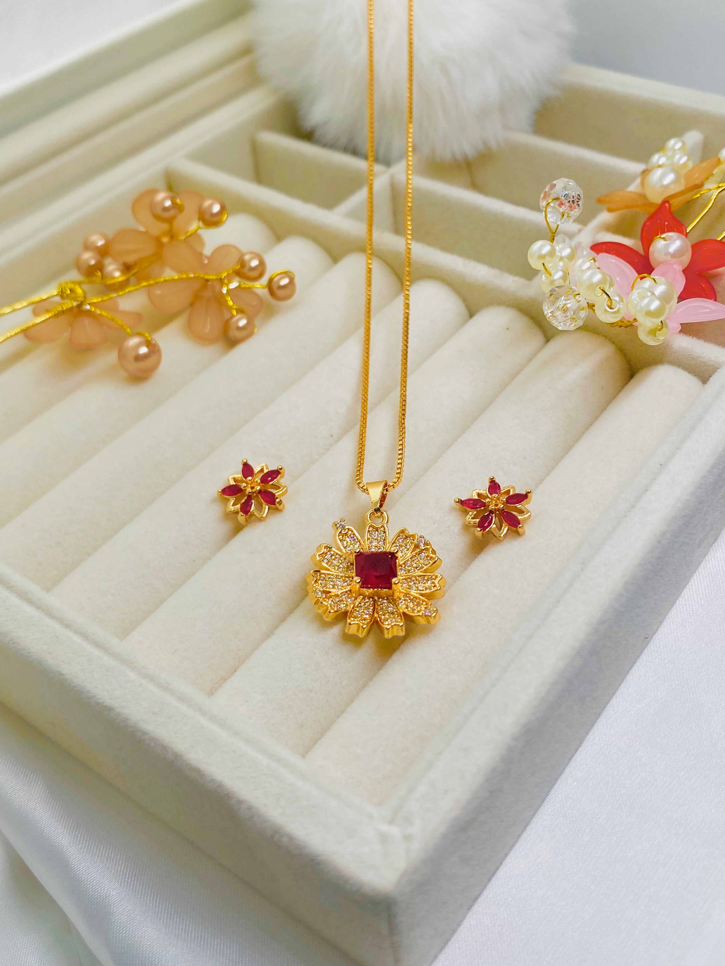 Elegant Gold-Plated Floral Pendant Set with Ruby Red Stones