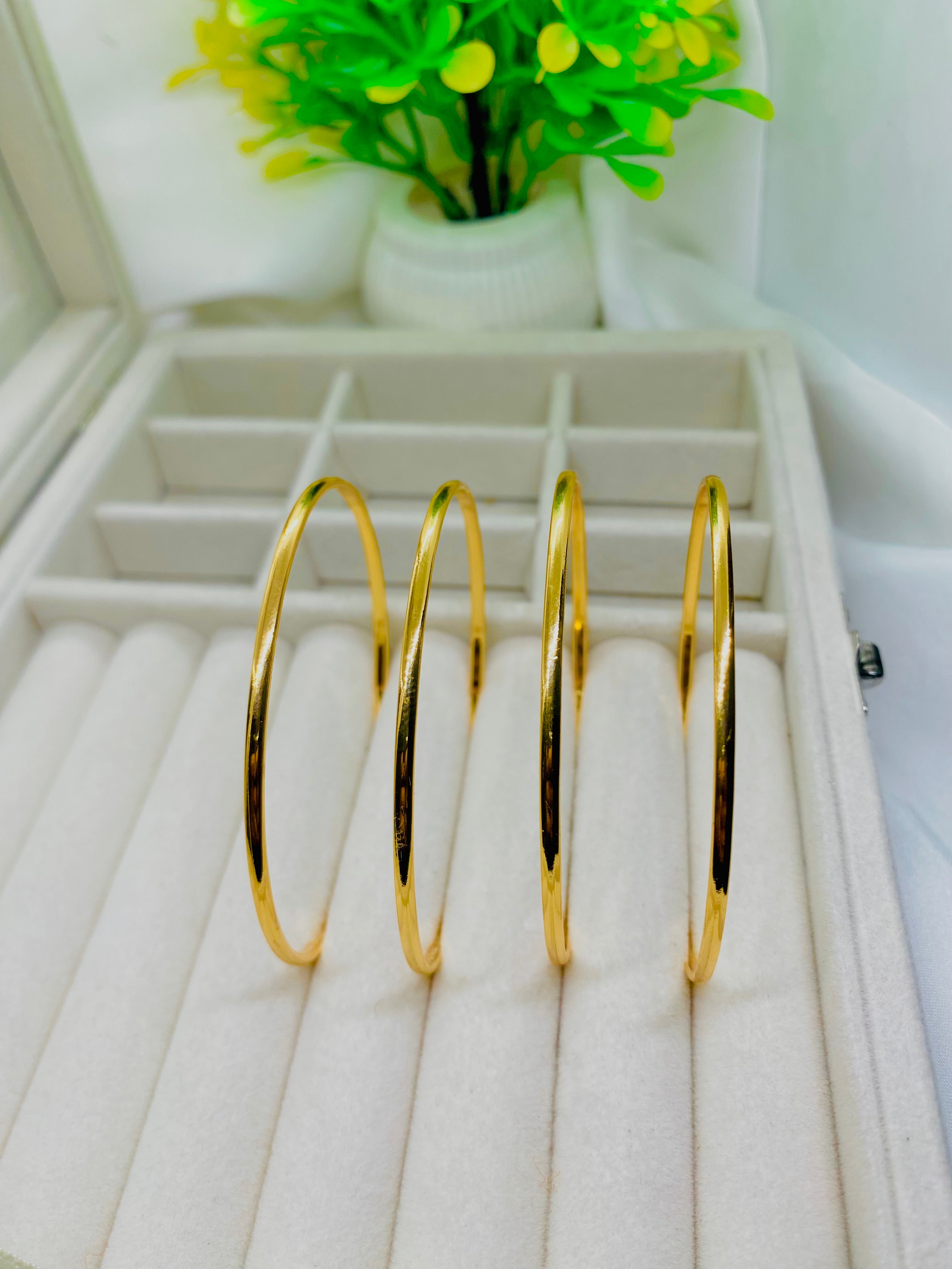 Elegant Gold-Plated Bangles – Set of 4