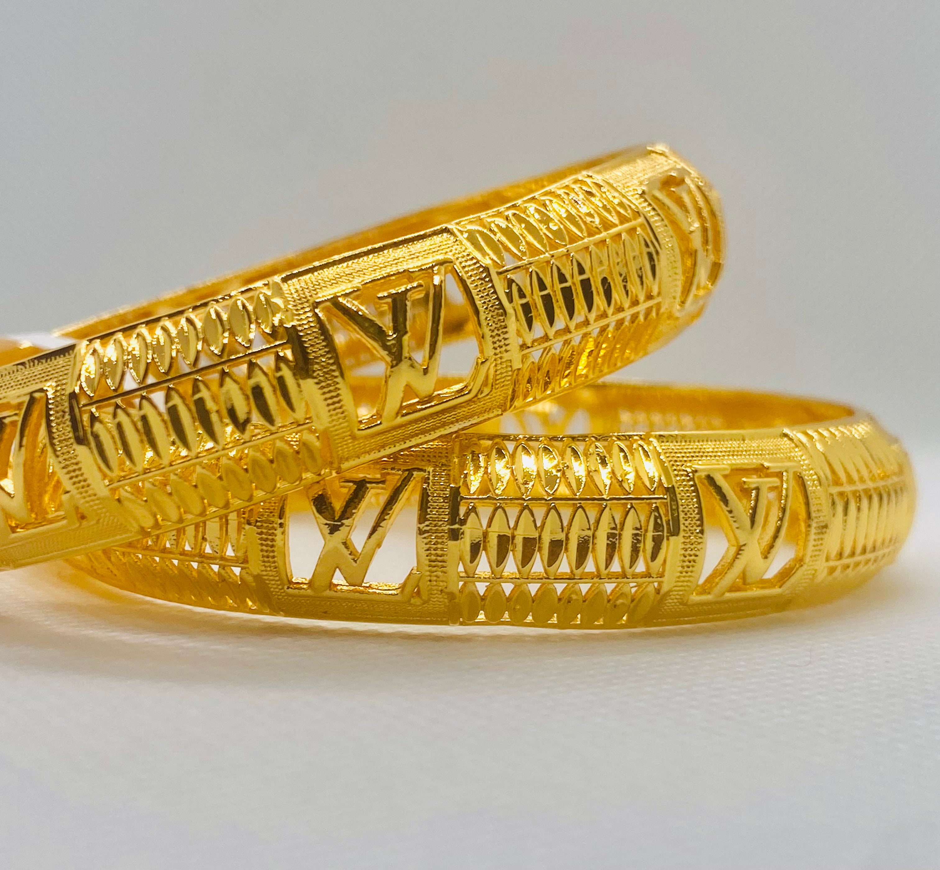 Louis Vuitton Gold Bangles – Elegant & Timeless Luxury