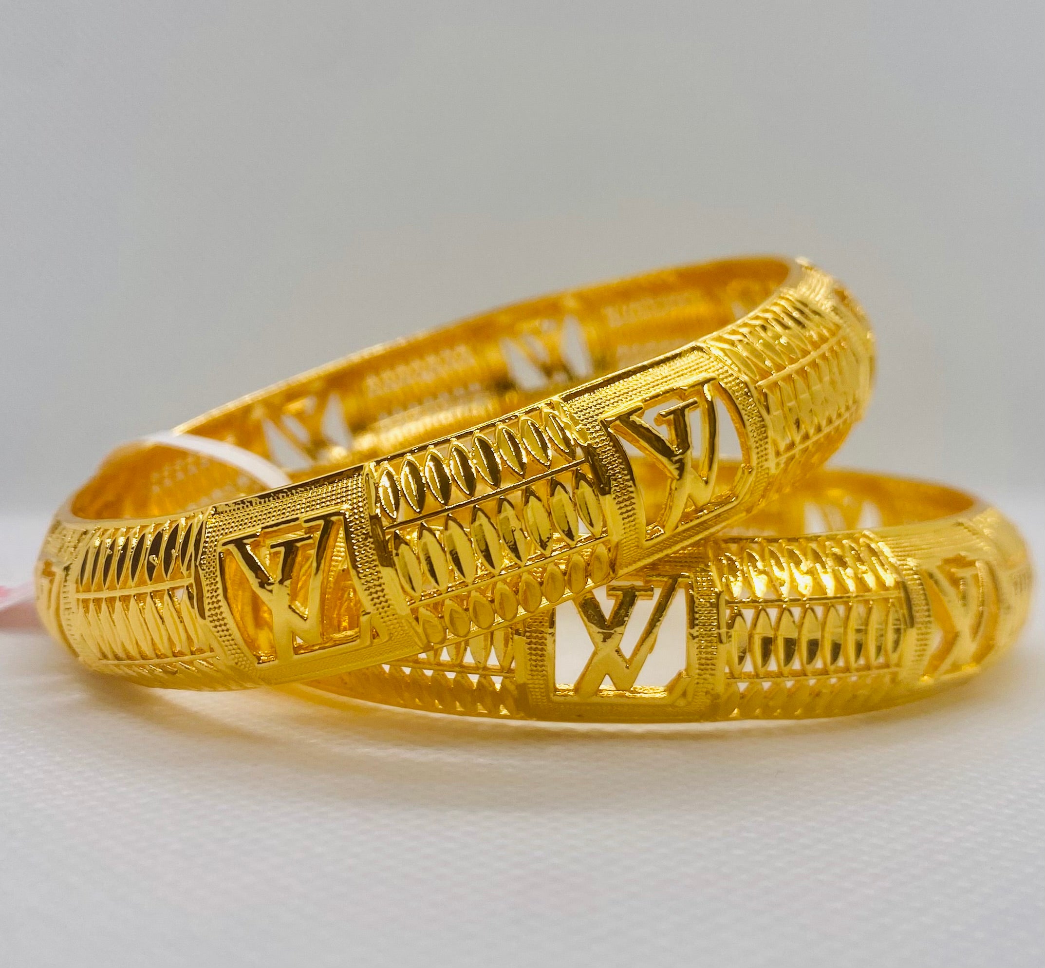 Louis Vuitton Gold Bangles – Elegant & Timeless Luxury