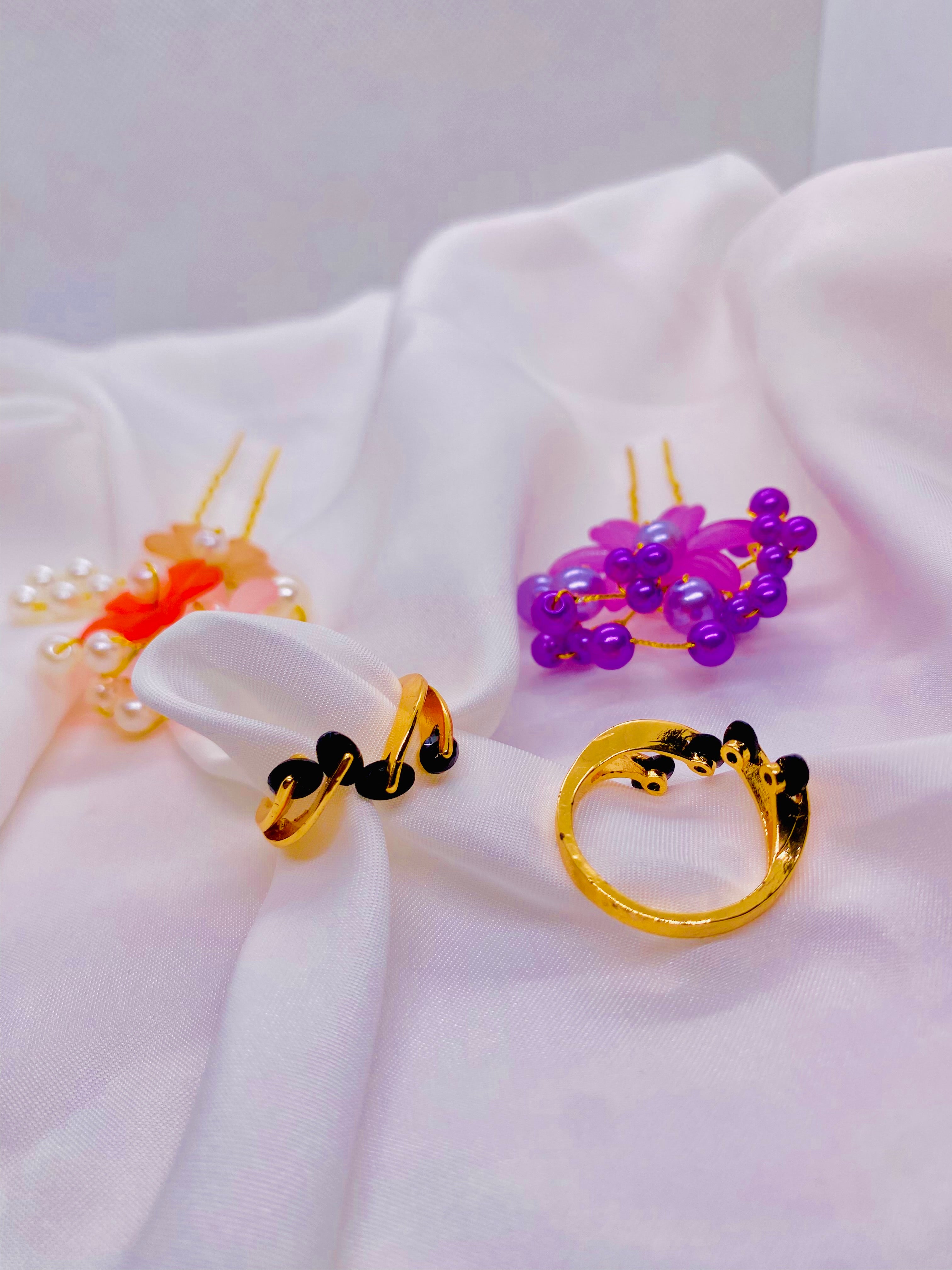 Golden Elegance – Black Heart Accent Rings