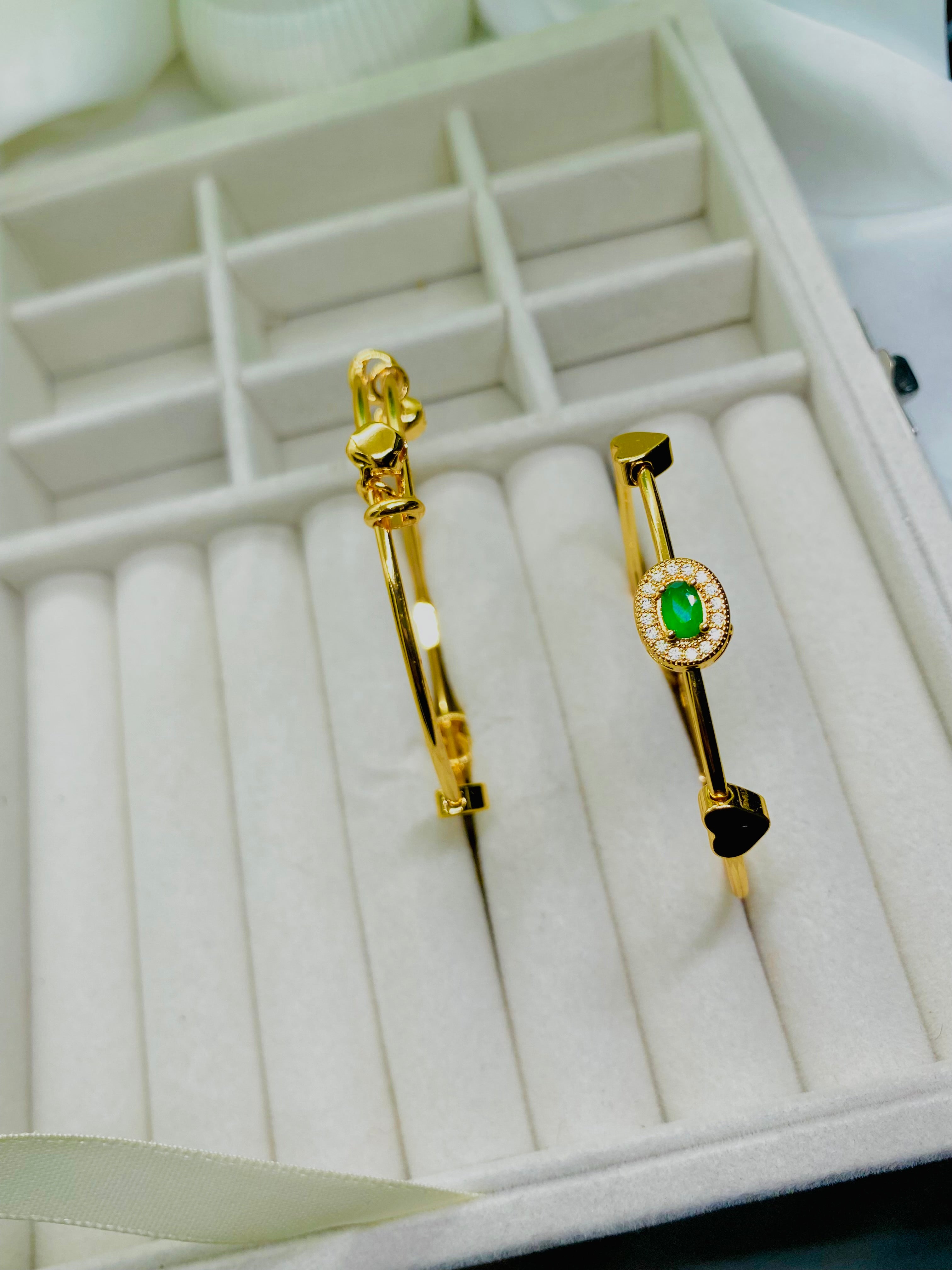 Elegant Gold-Plated Bangles with Green Stone Accent