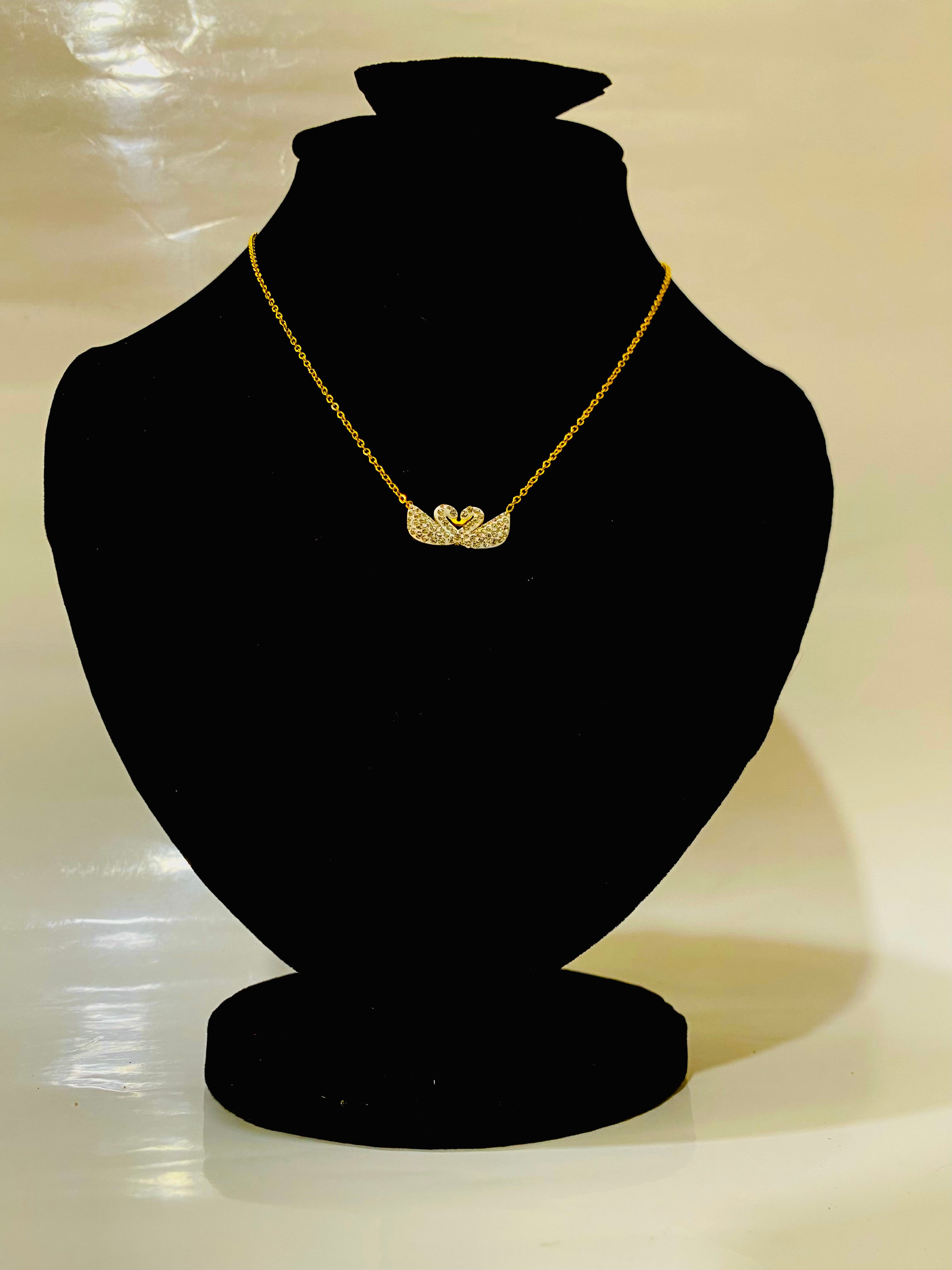 Elegant Gold Necklace with Swan-Inspired Pendant