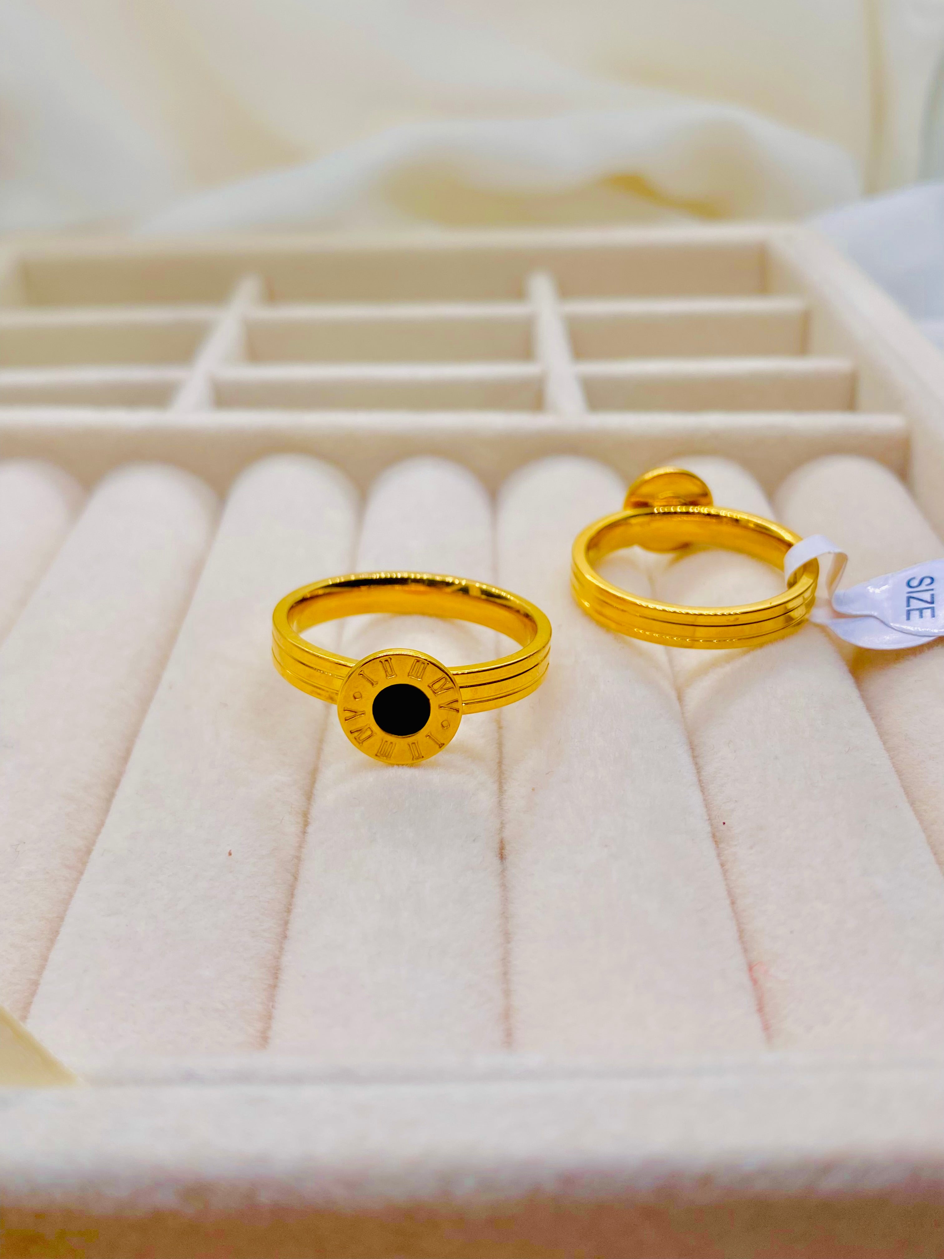 Elegant Gold Roman Numeral Rings with Black Enamel Center