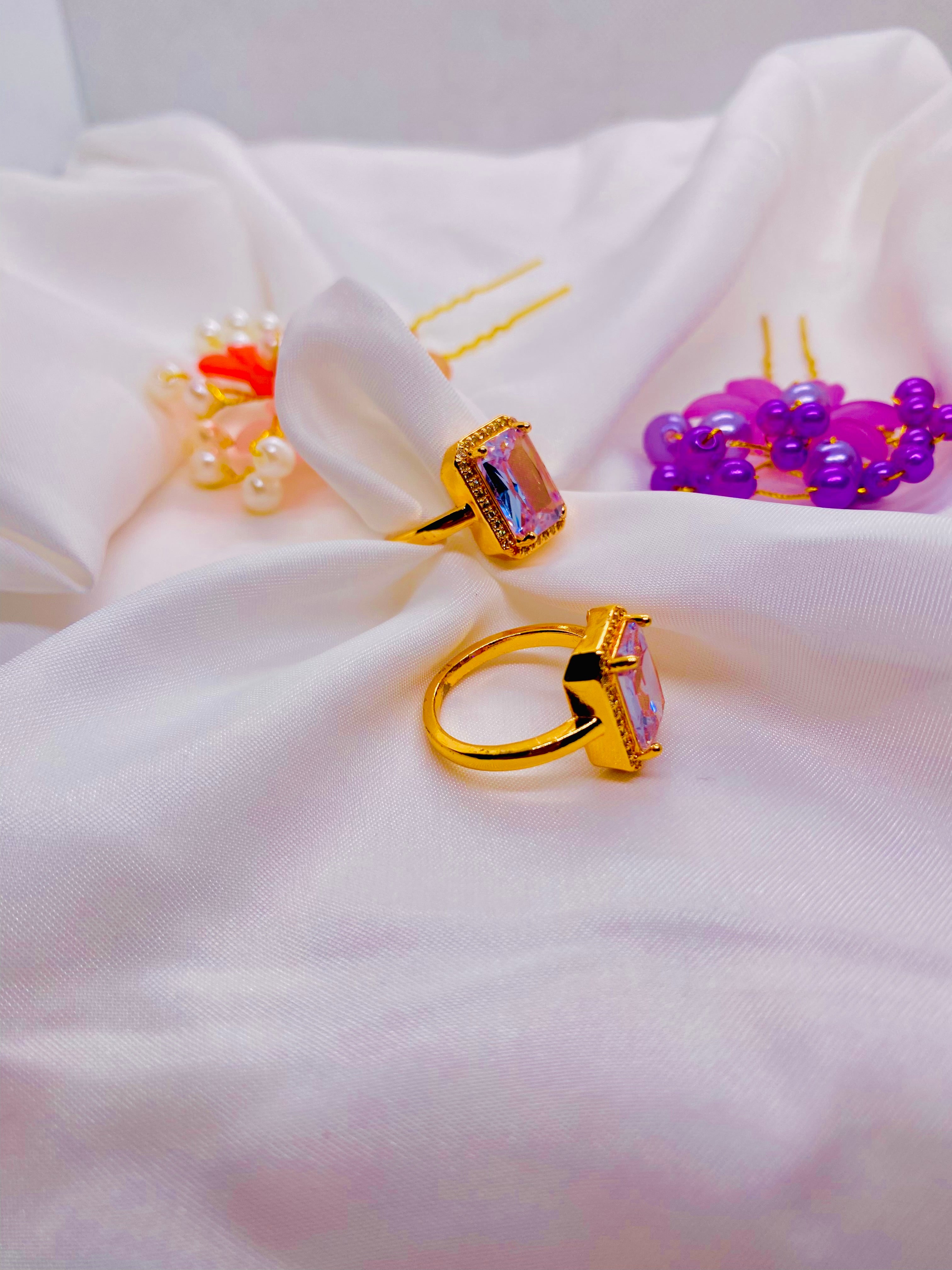 Elegant Golden Rings with Radiant Pink Gemstones