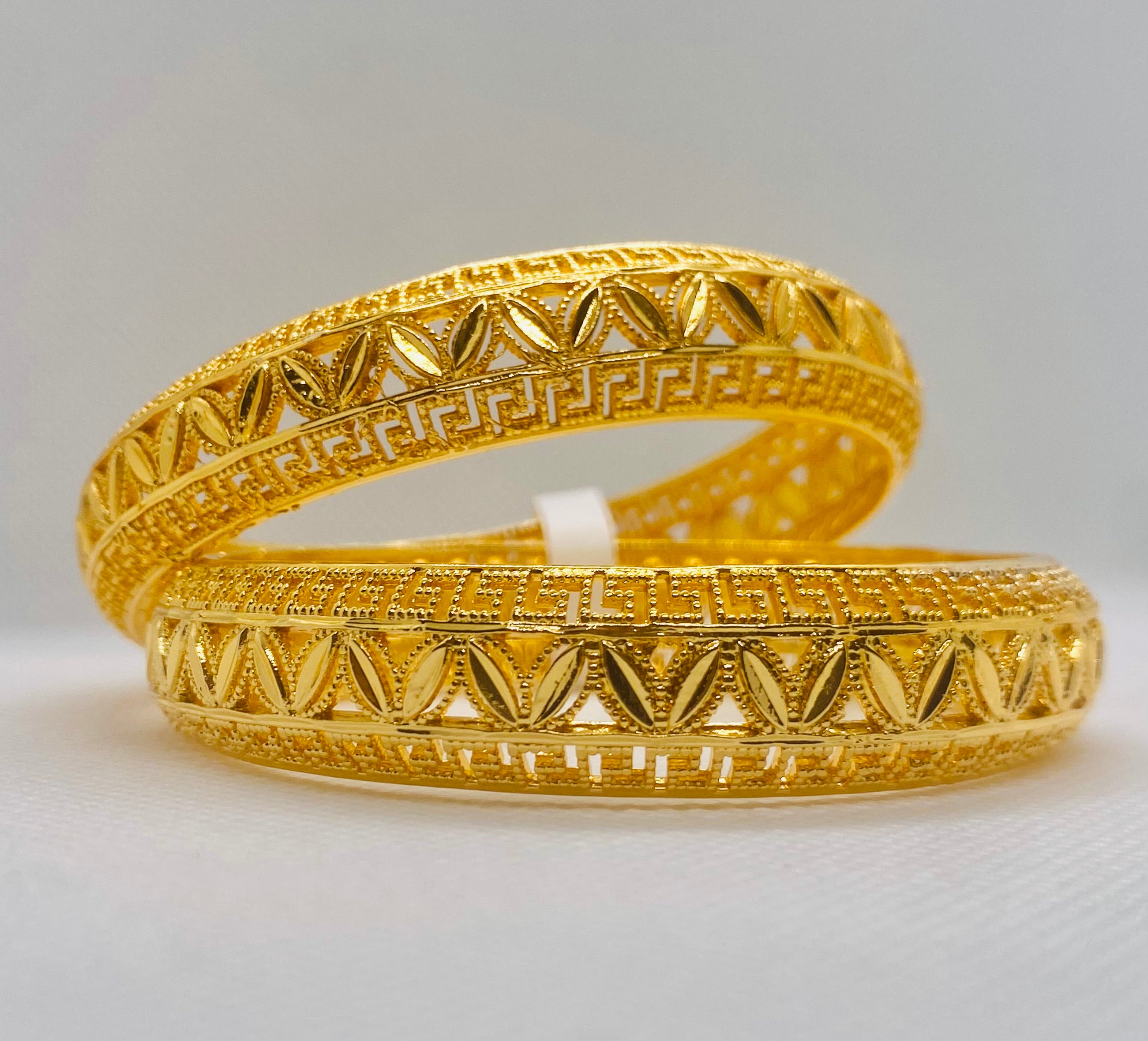 Exquisite Gold Bangles with Intricate Greek Key and Leaf Motif