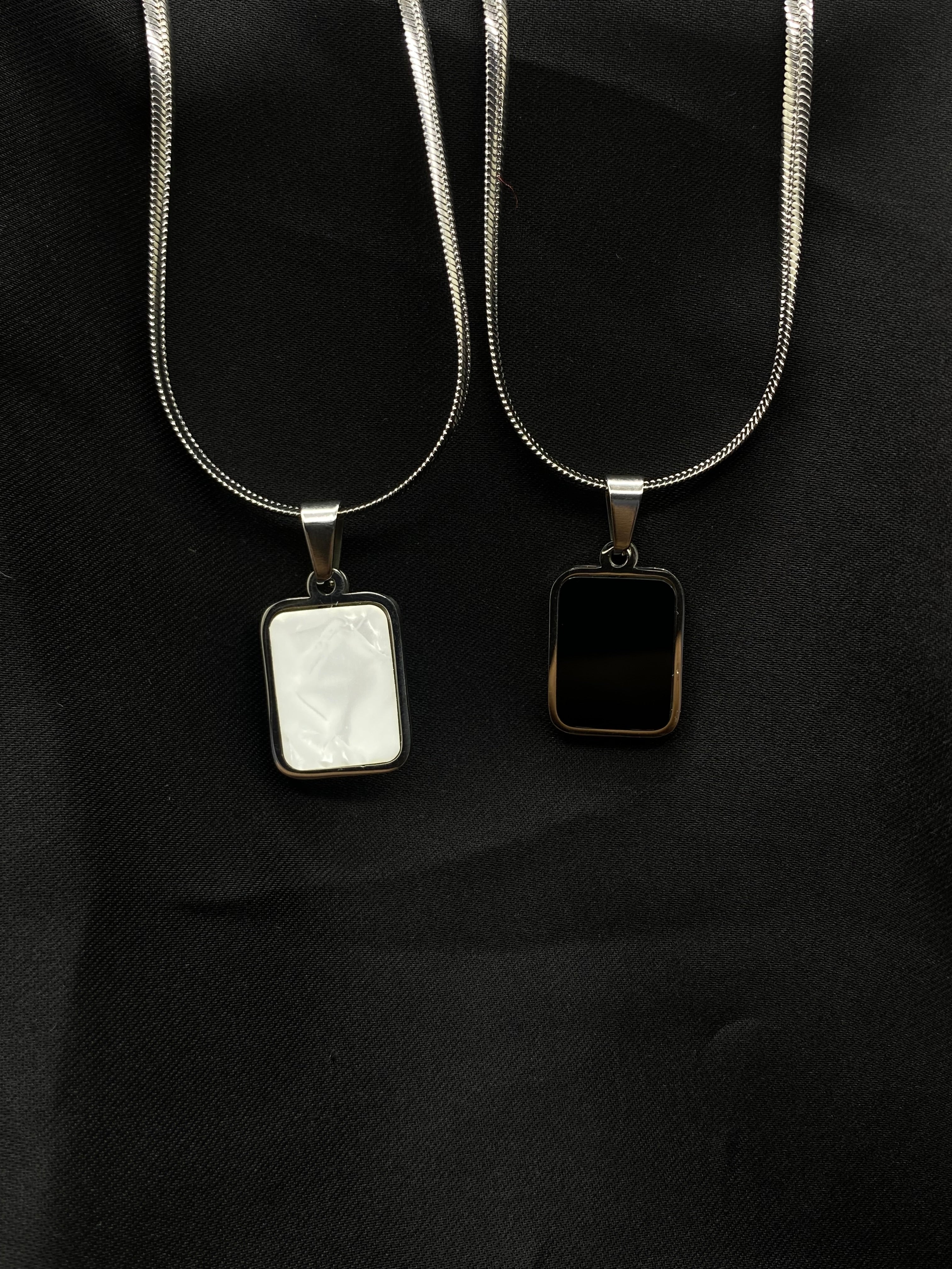 Dual-Sided Elegance: Black & White Pendant Necklace