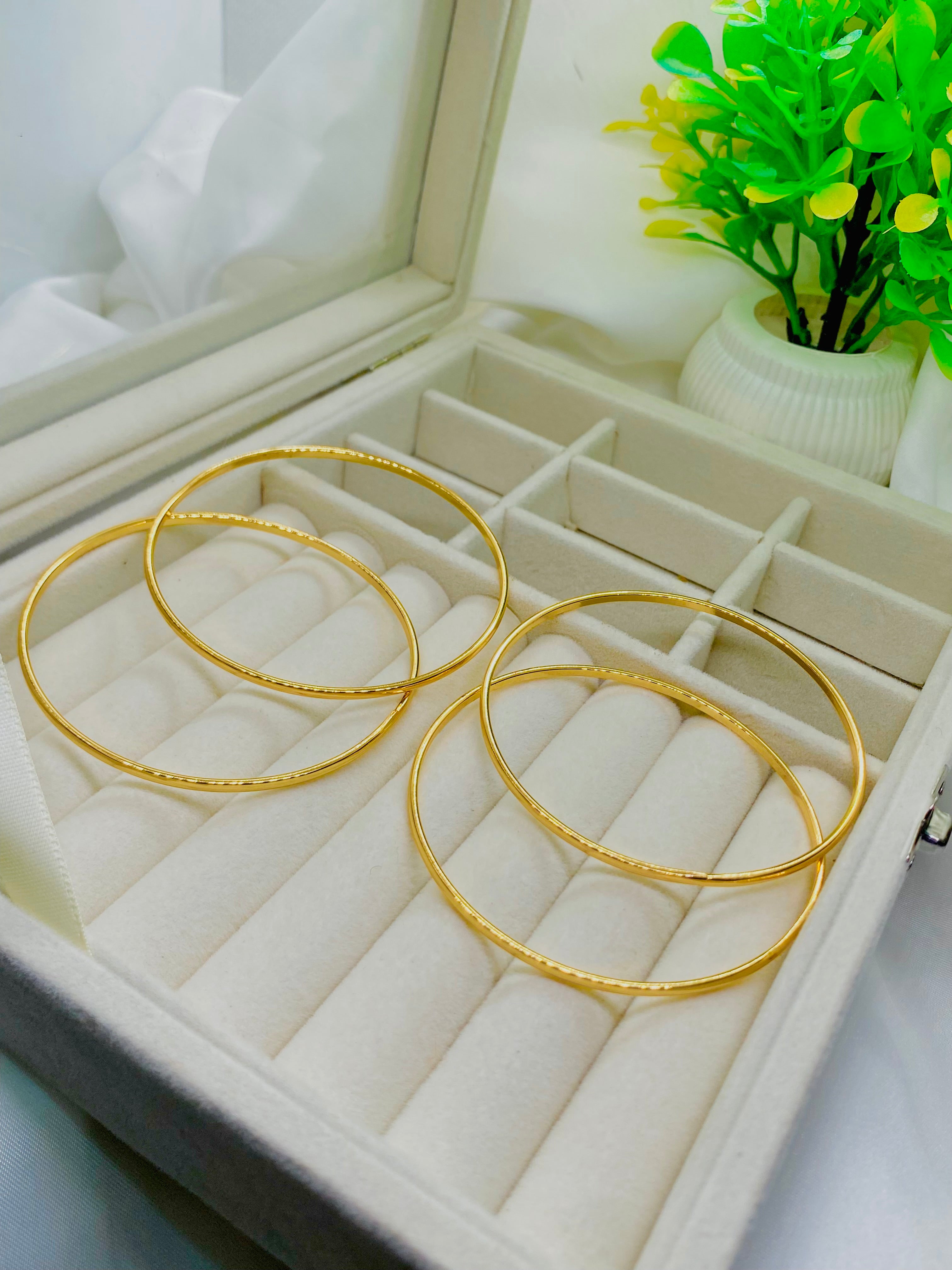Elegant Gold-Plated Bangles – Set of 4