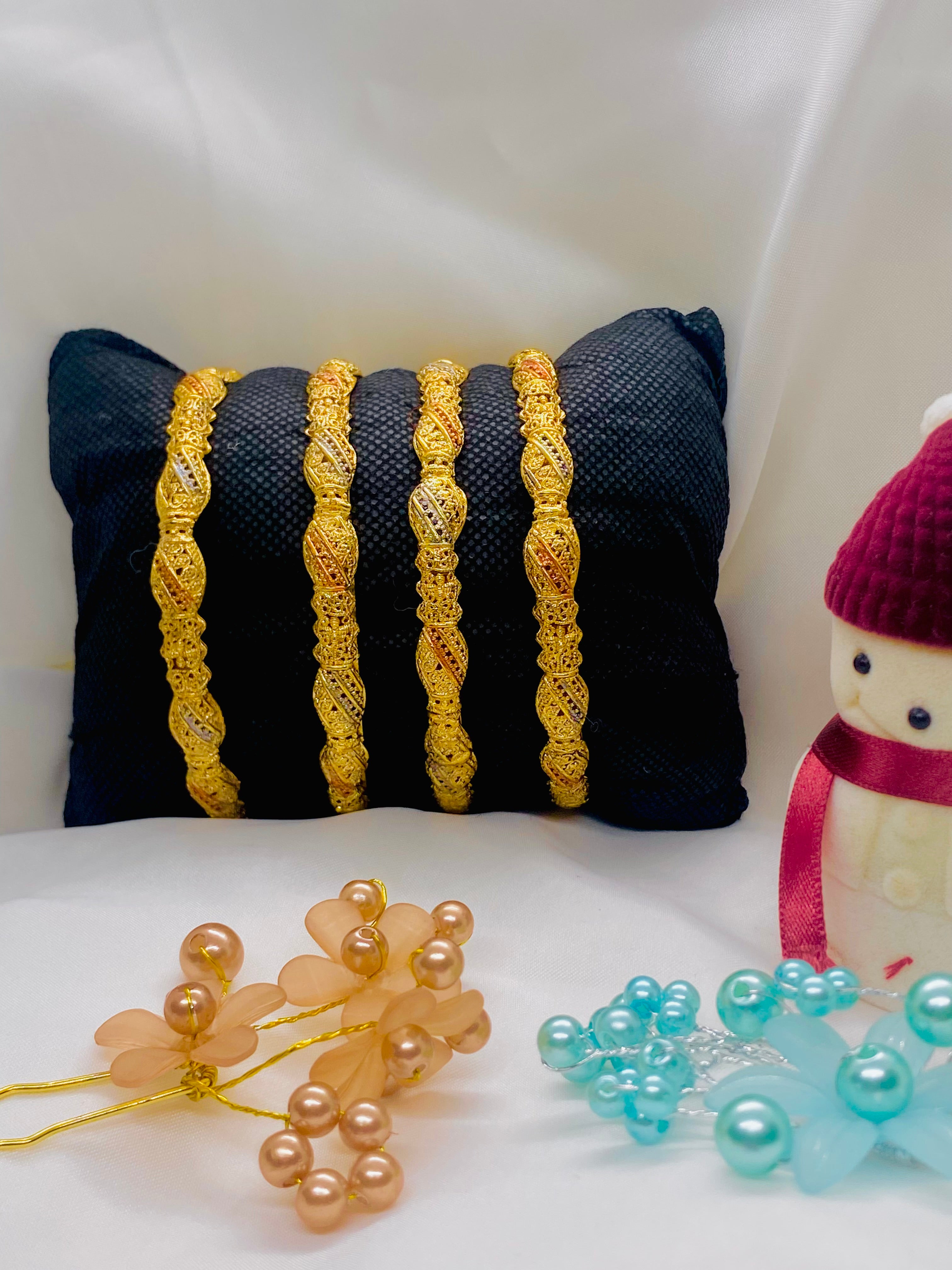 Gold-Plated Bangles with Dual-Tone Detailing – Set of Four