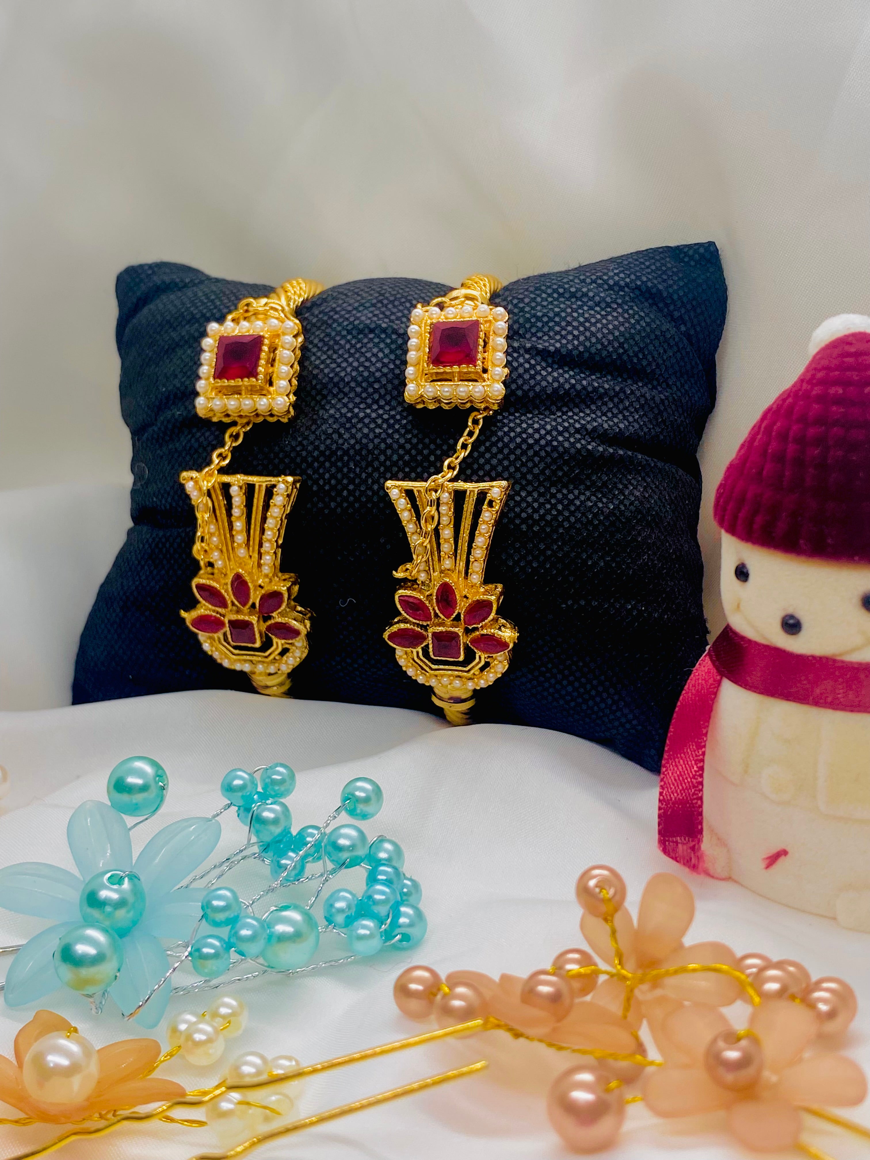 Royal Gold Earrings with Ruby Stones and Pearl Detailing