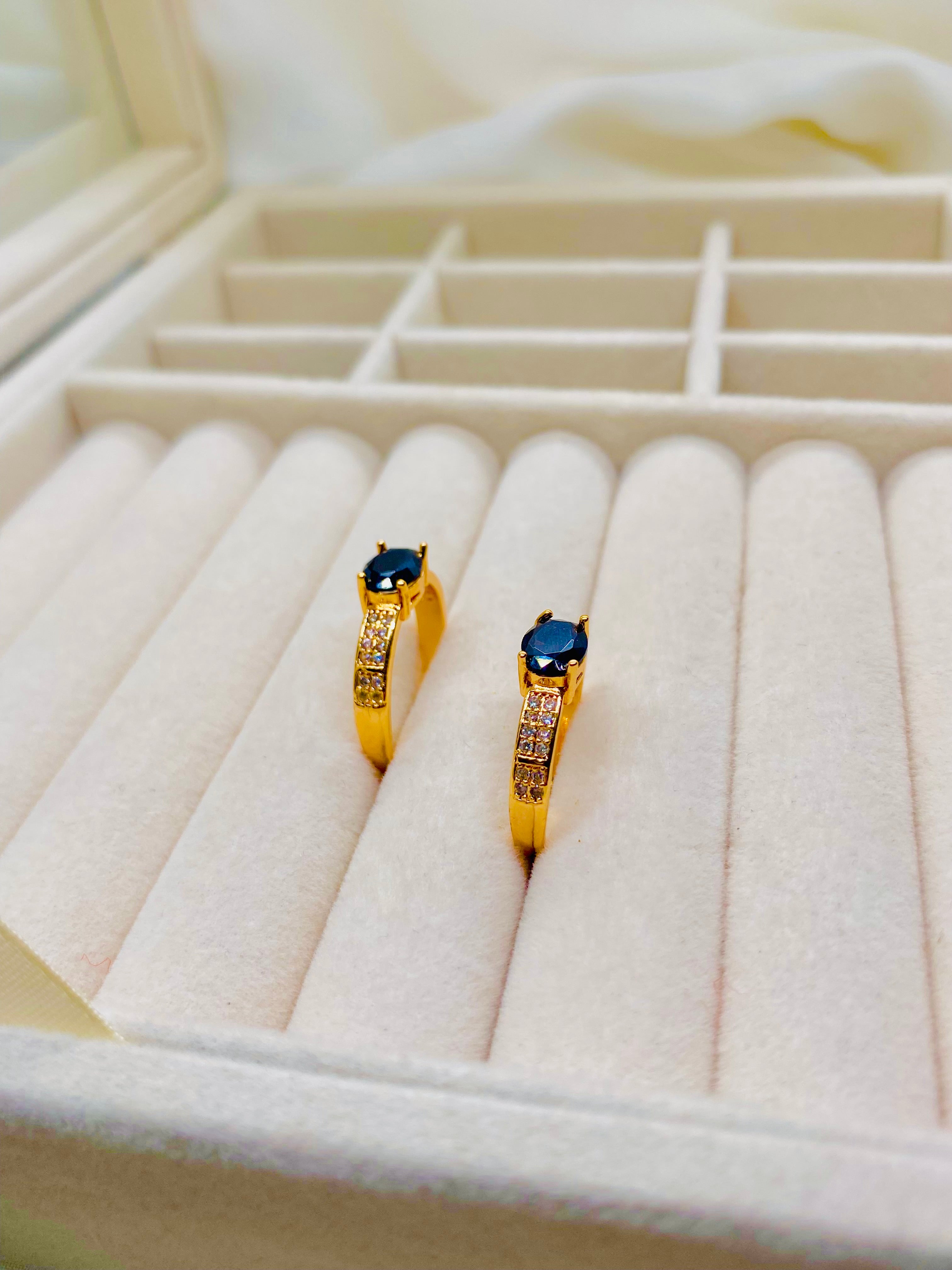 Elegant Gold-Plated Rings with Black Onyx Centerpiece