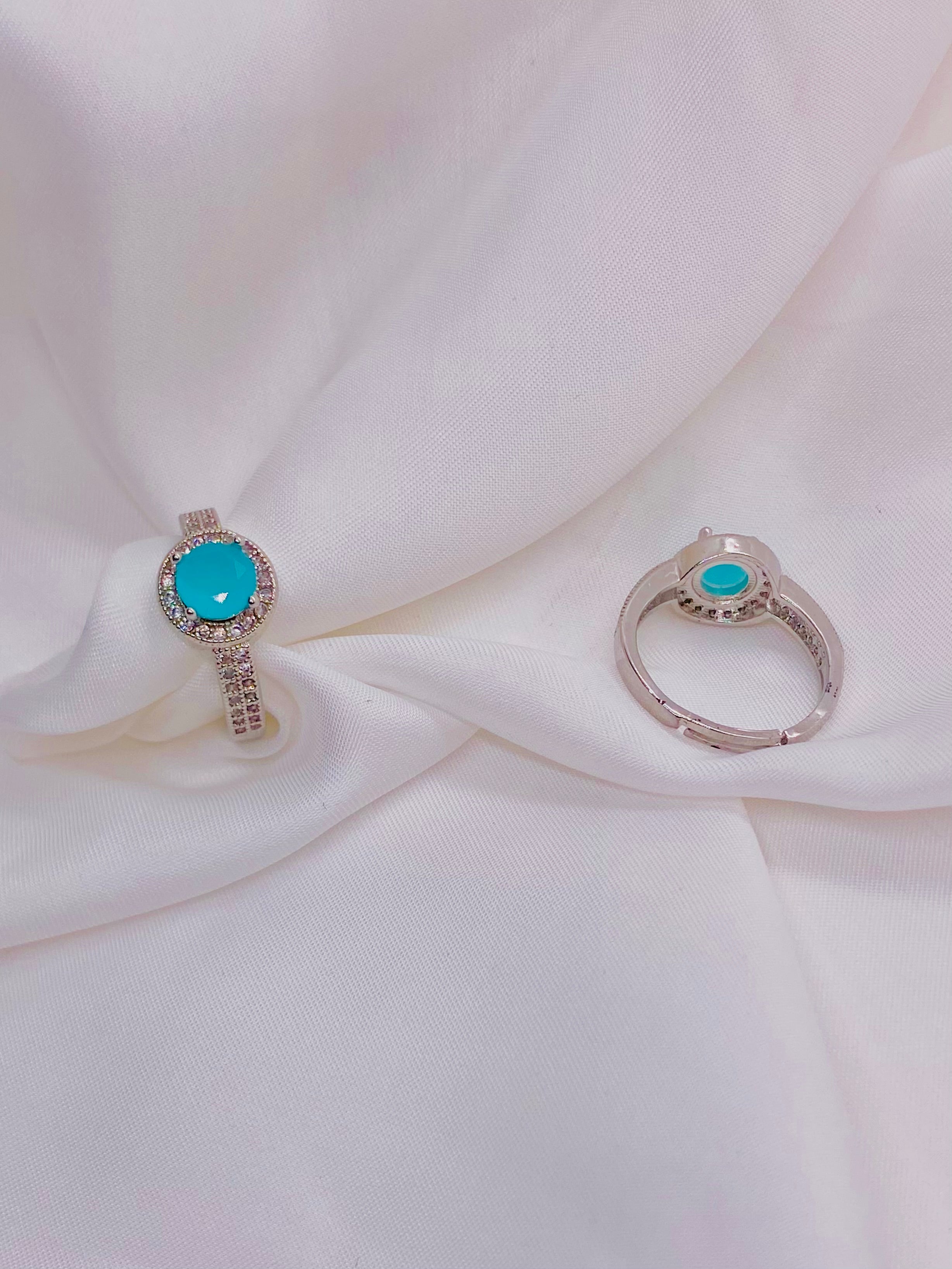 Elegant Turquoise Solitaire Halo Ring in Sterling Silver