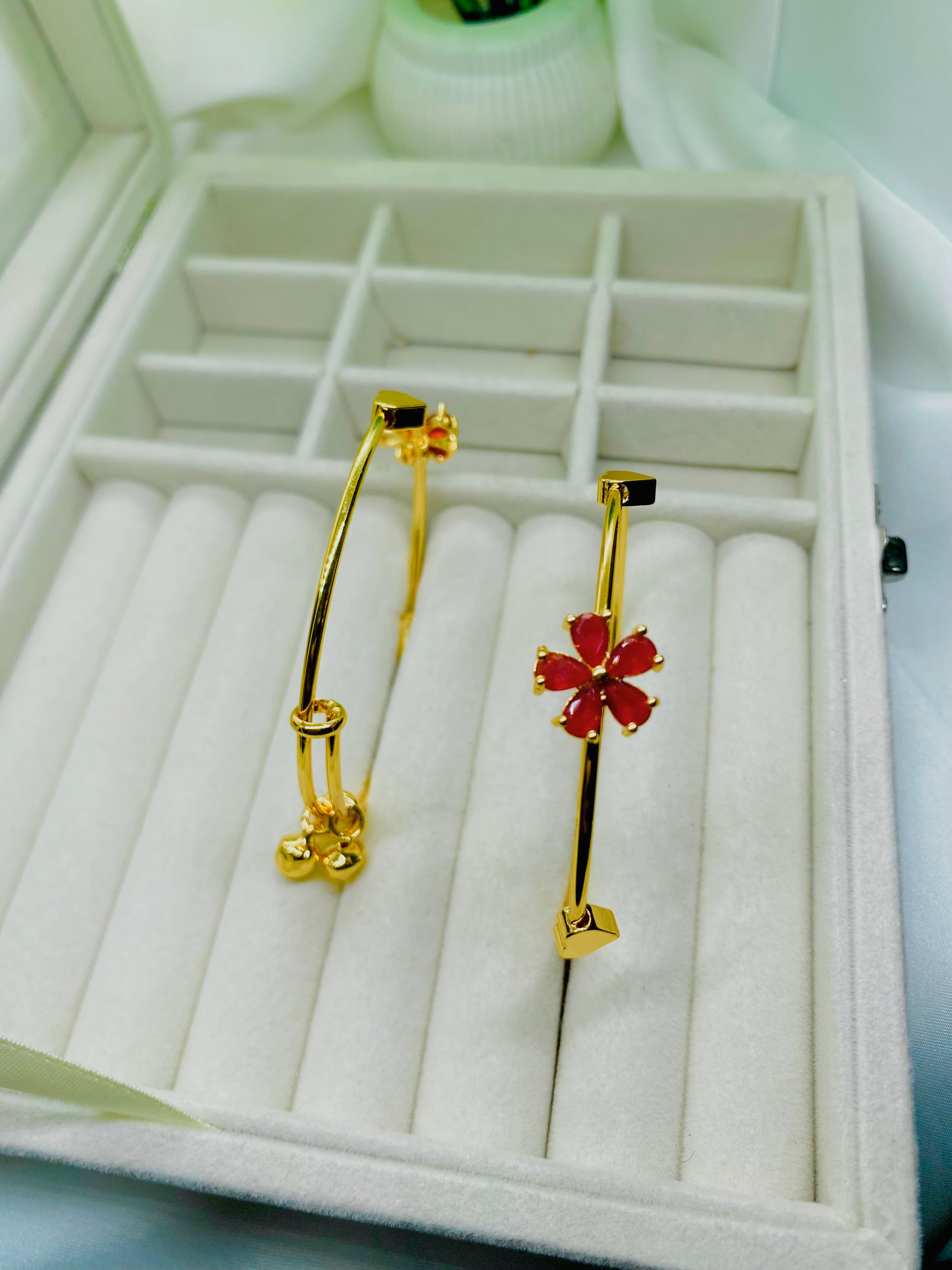 Elegant Gold-Plated Bangles with Red Floral and Charm Accents