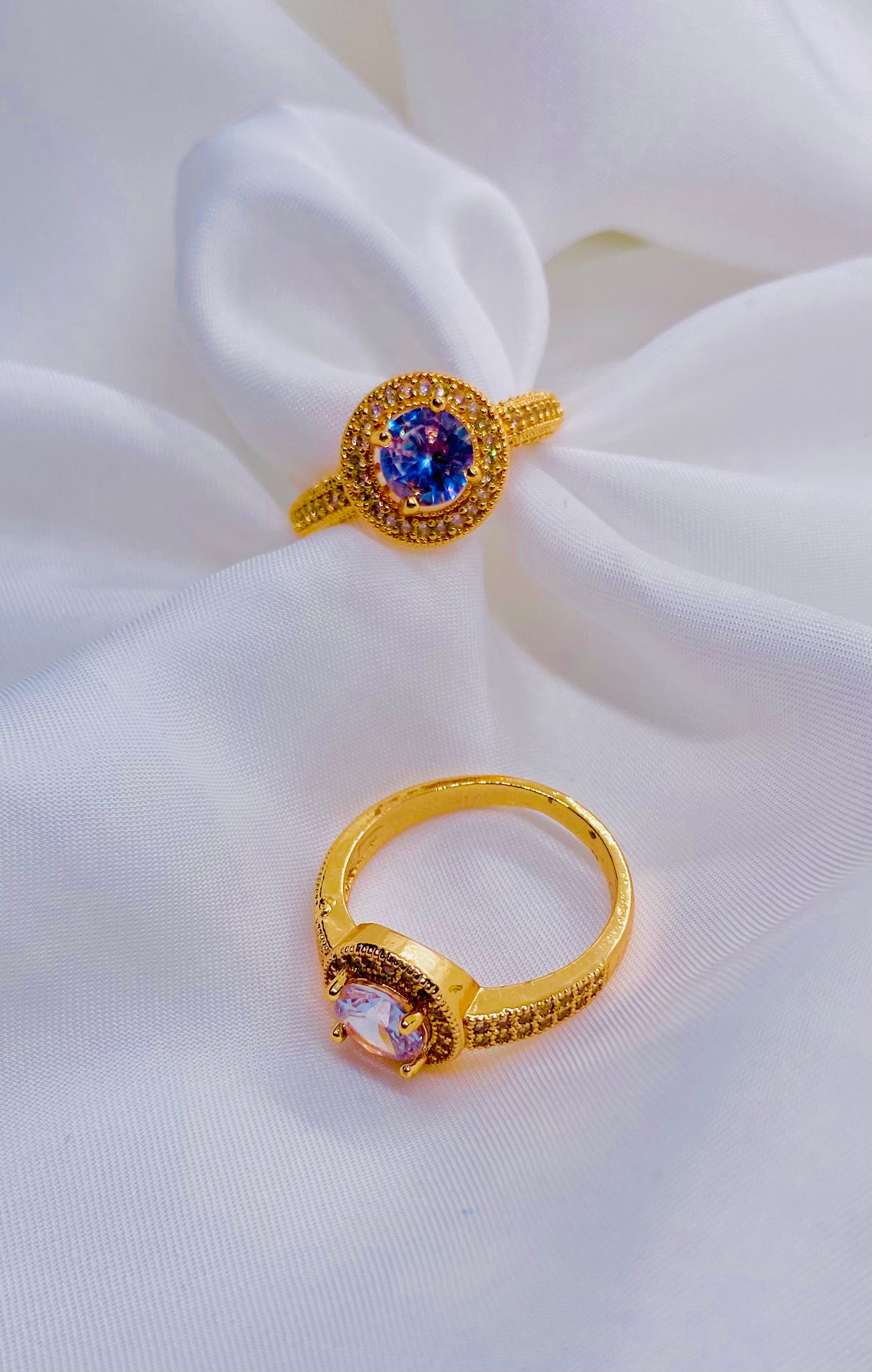 Vintage-Inspired Gold Rings with Iridescent Center Stones
