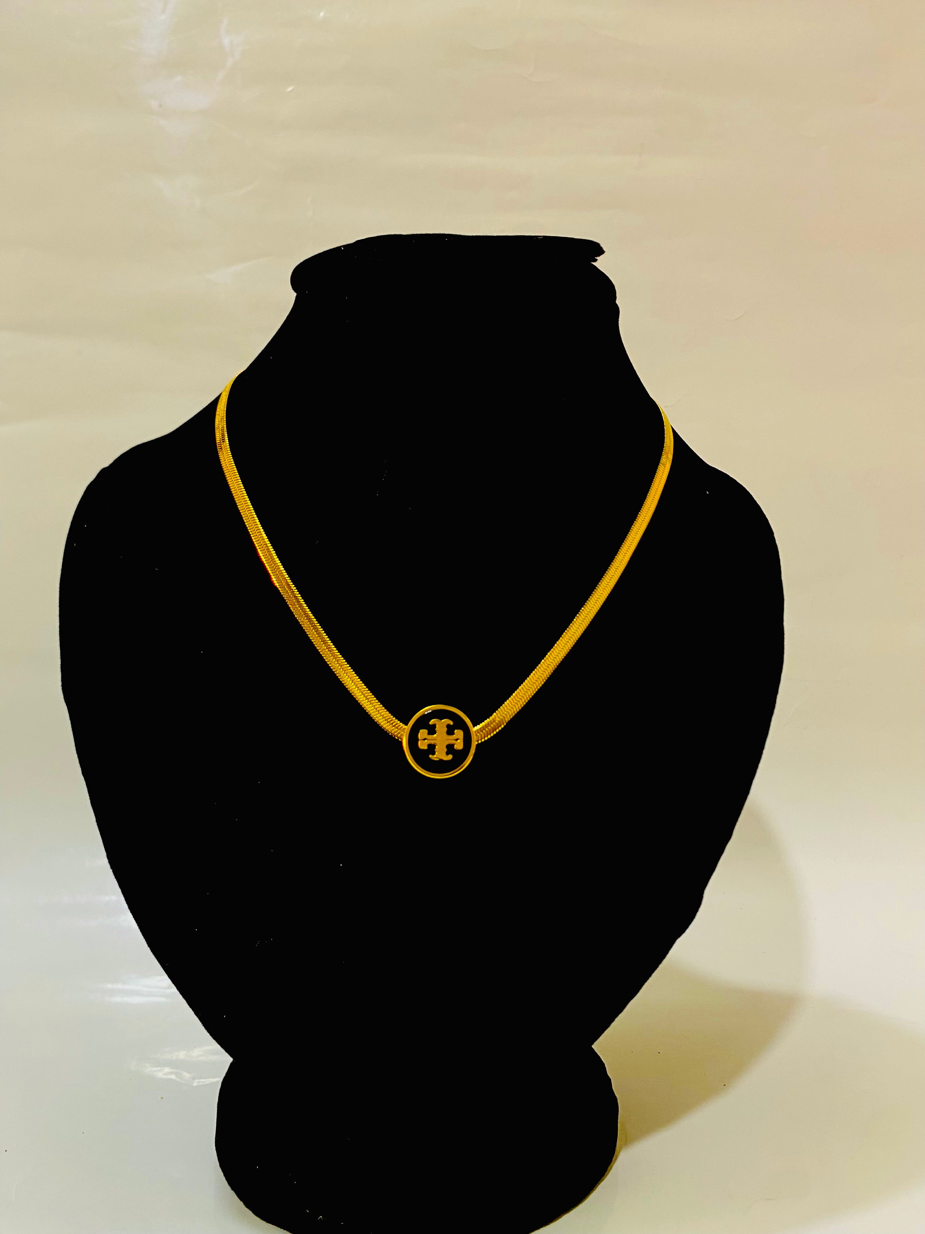 Elegant Gold-Plated Pendant Necklace with Signature Emblem
