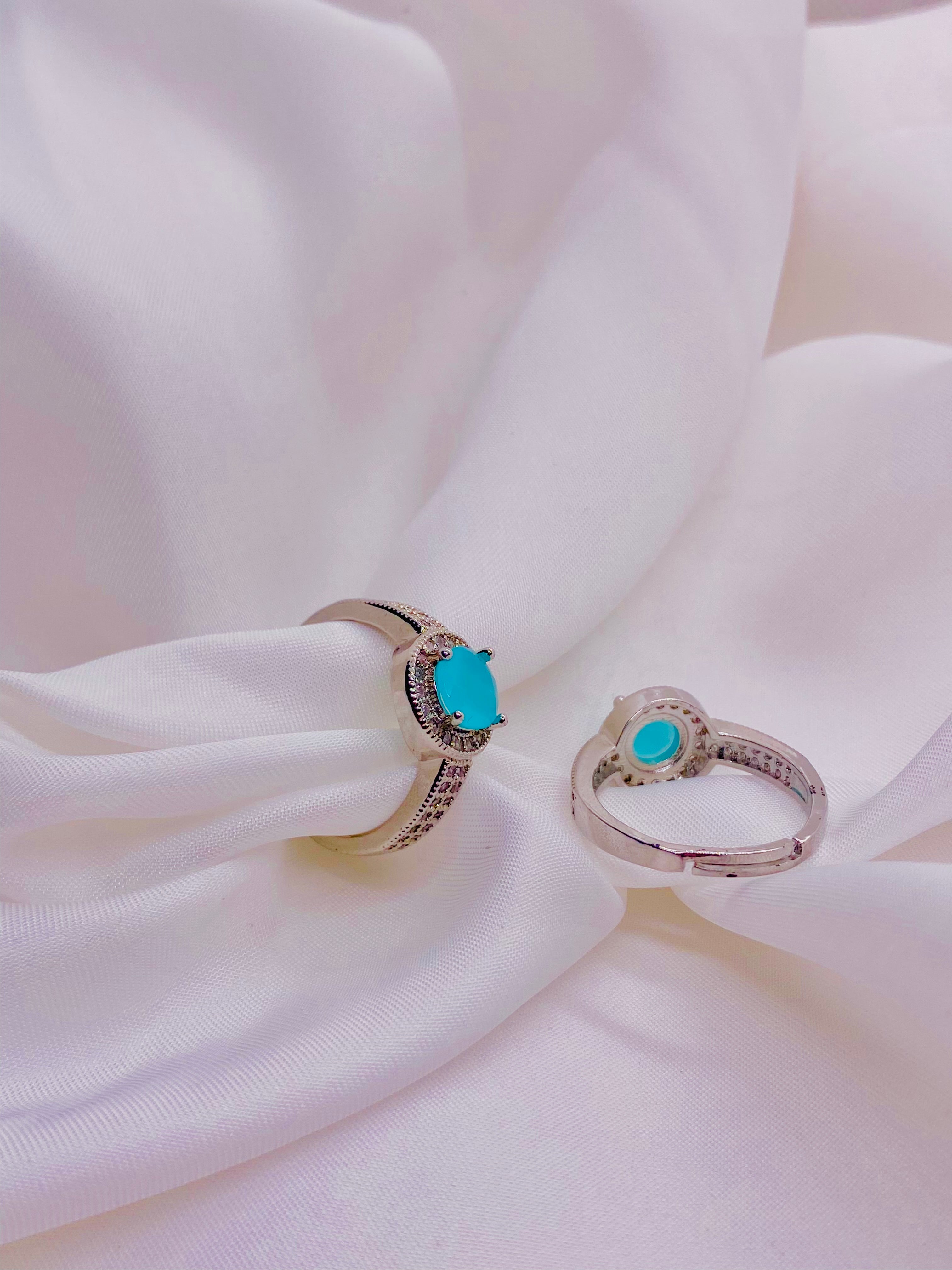 Elegant Turquoise Solitaire Halo Ring in Sterling Silver