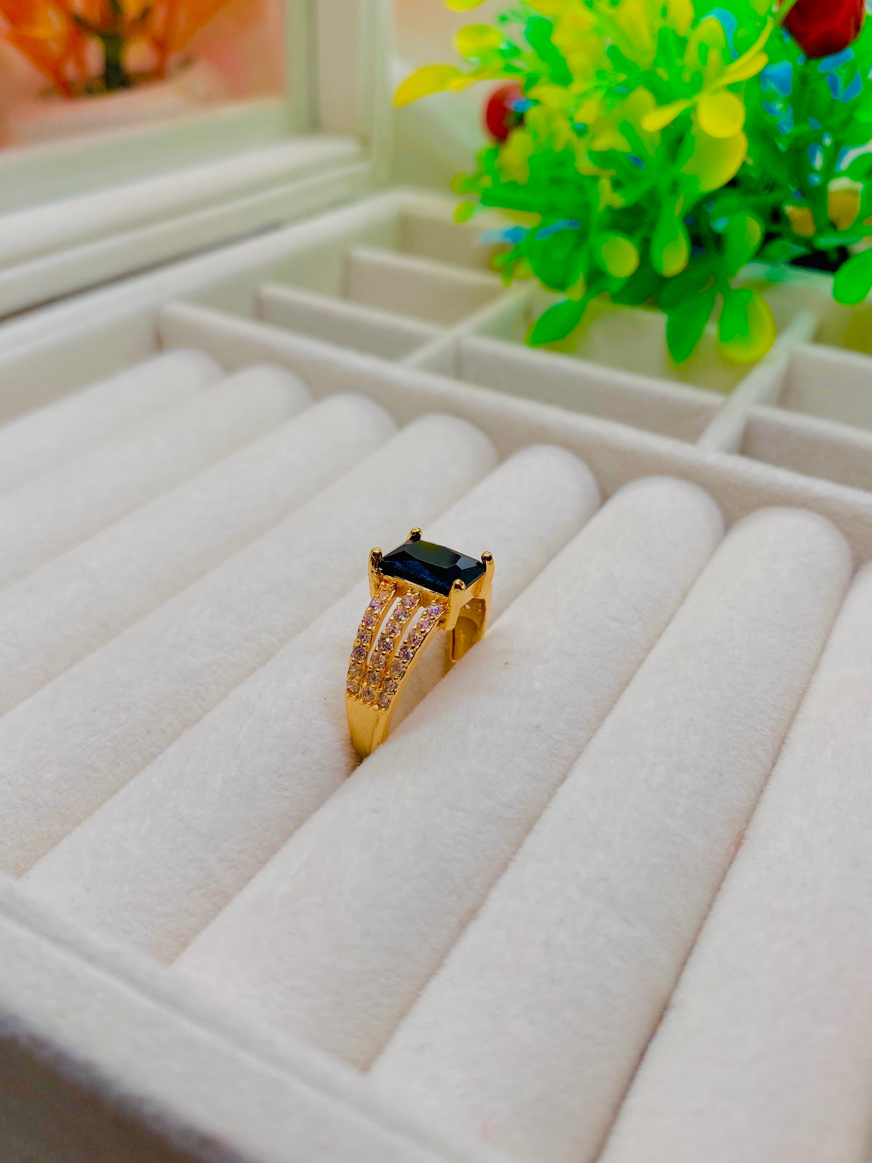 Elegant Gold-Plated Ring with Black Onyx Centerpiece