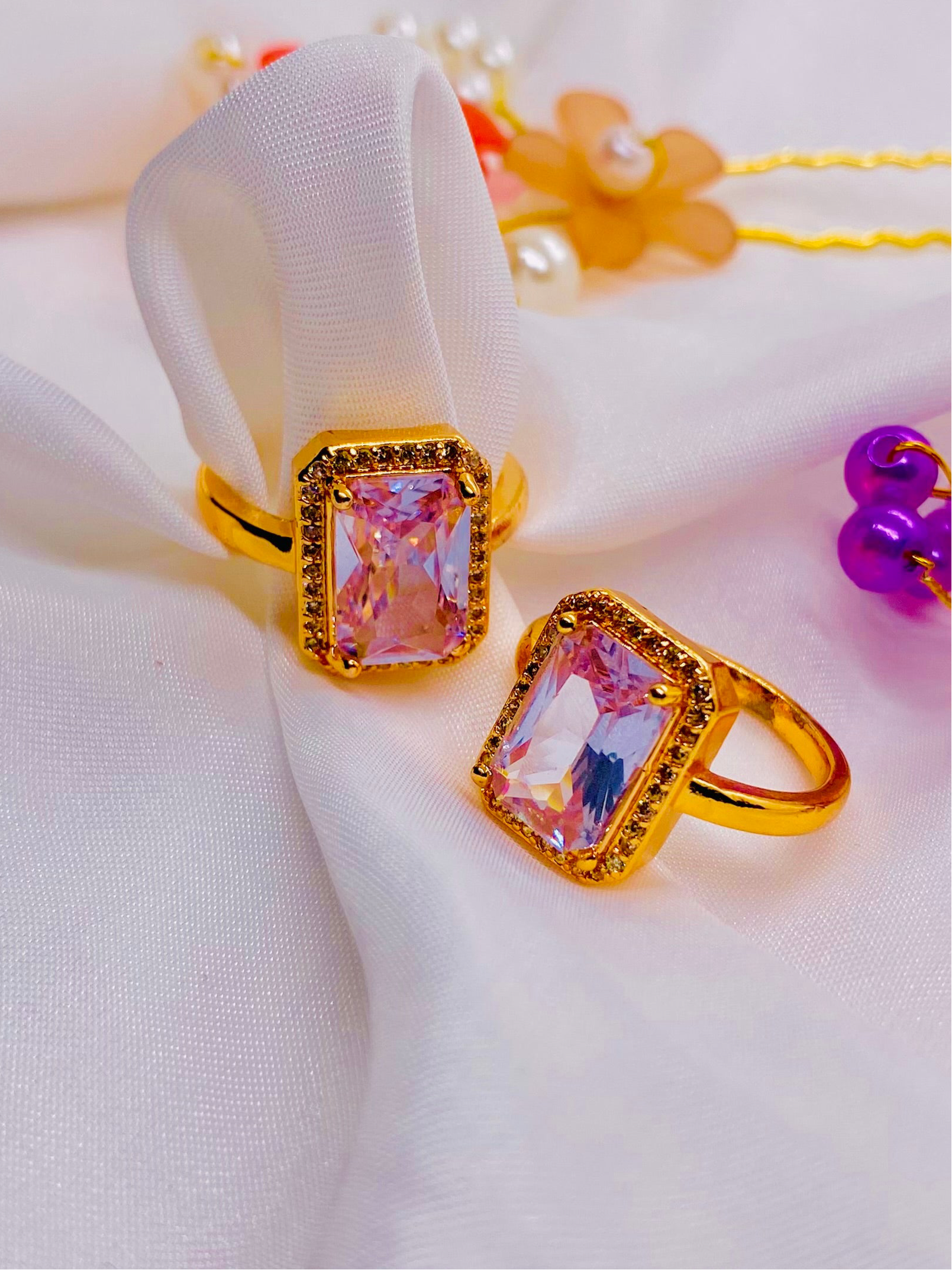 Elegant Golden Rings with Radiant Pink Gemstones