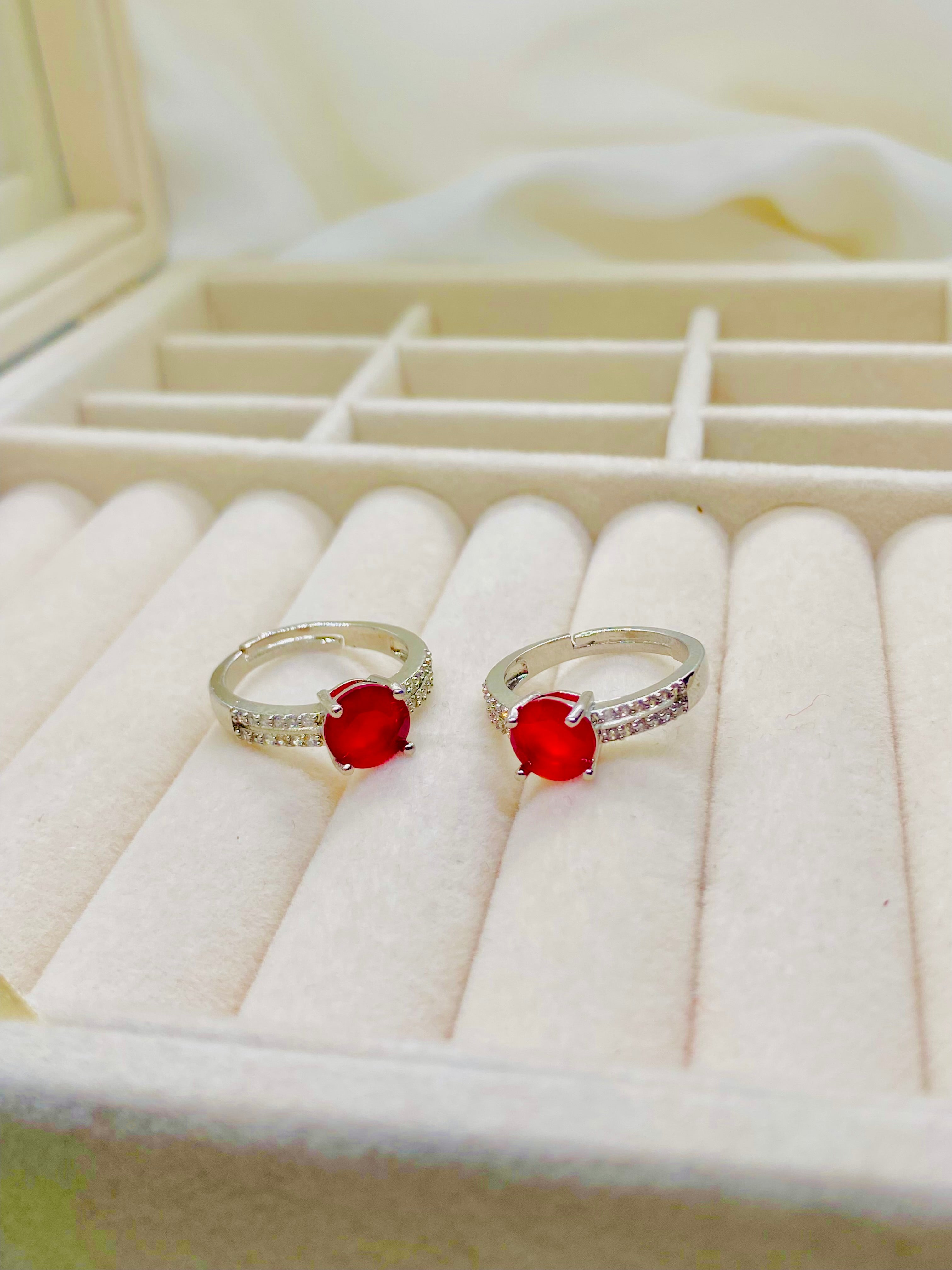 Elegant Ruby Solitaire Rings with Accent Diamonds
