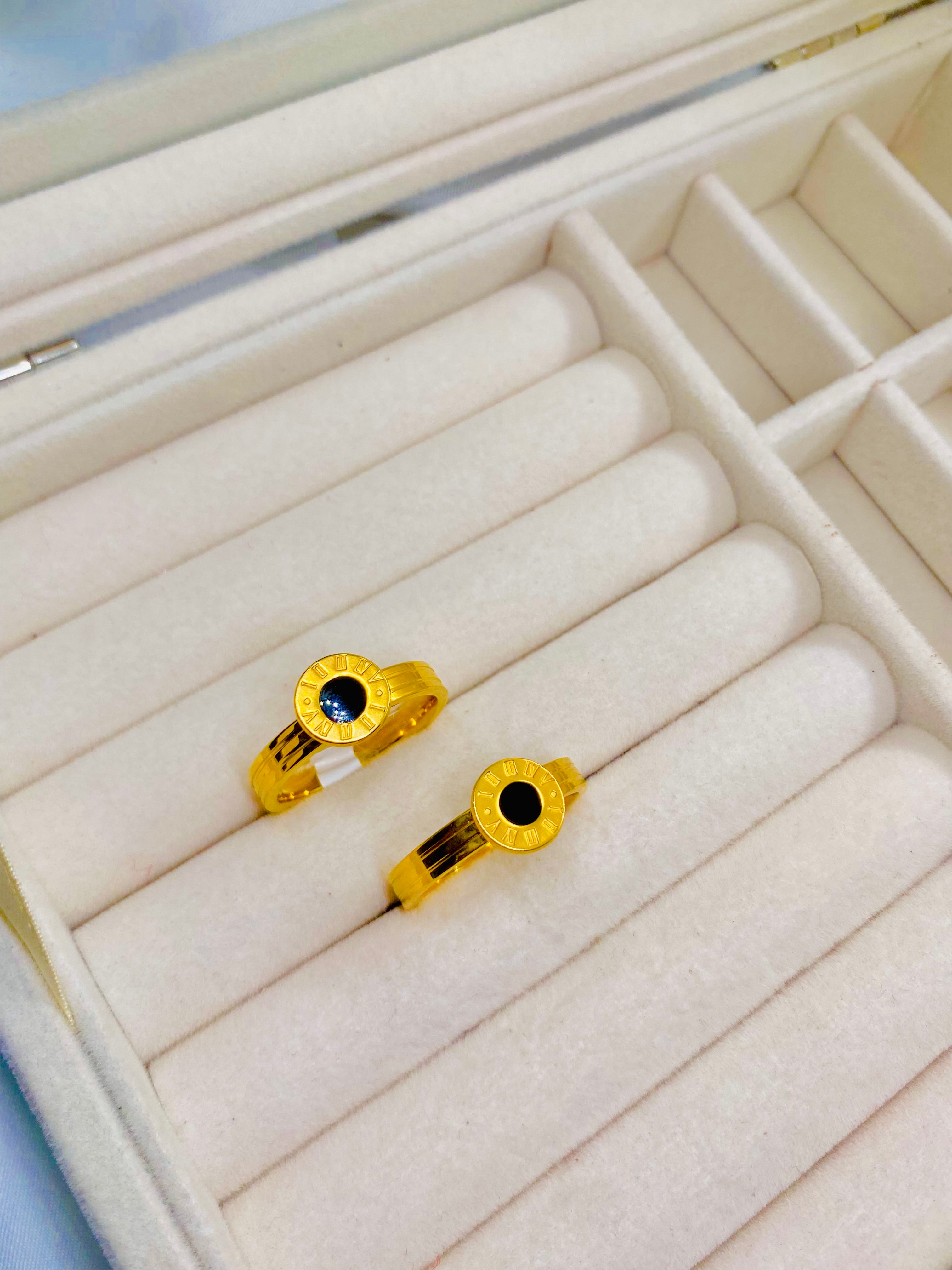Elegant Gold Roman Numeral Rings with Black Enamel Center