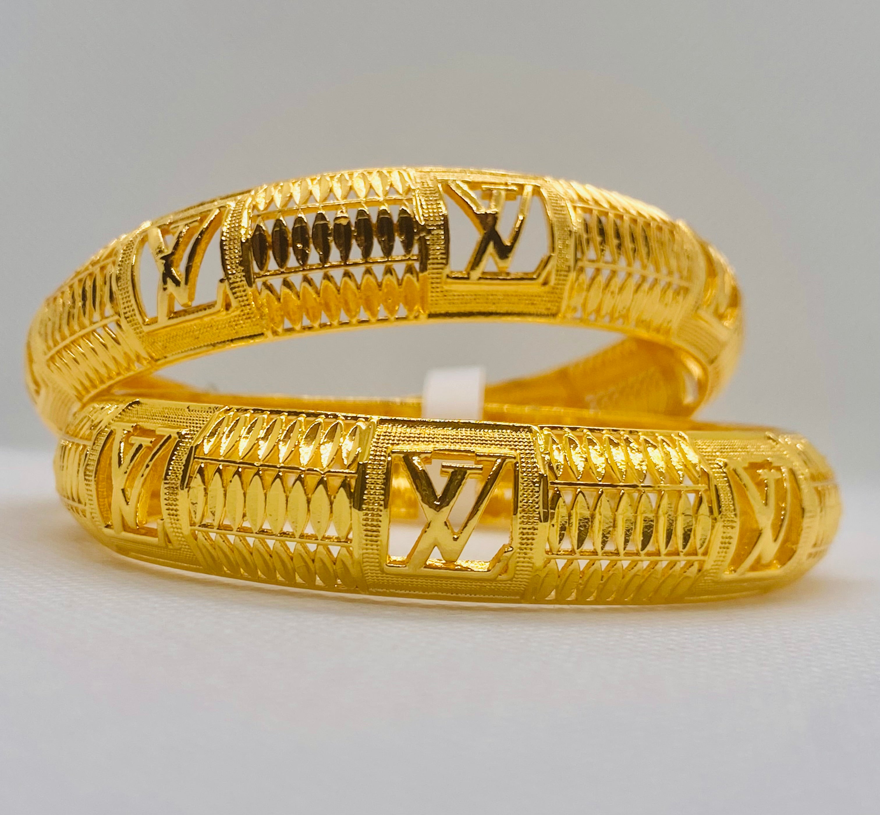 Louis Vuitton Gold Bangles – Elegant & Timeless Luxury