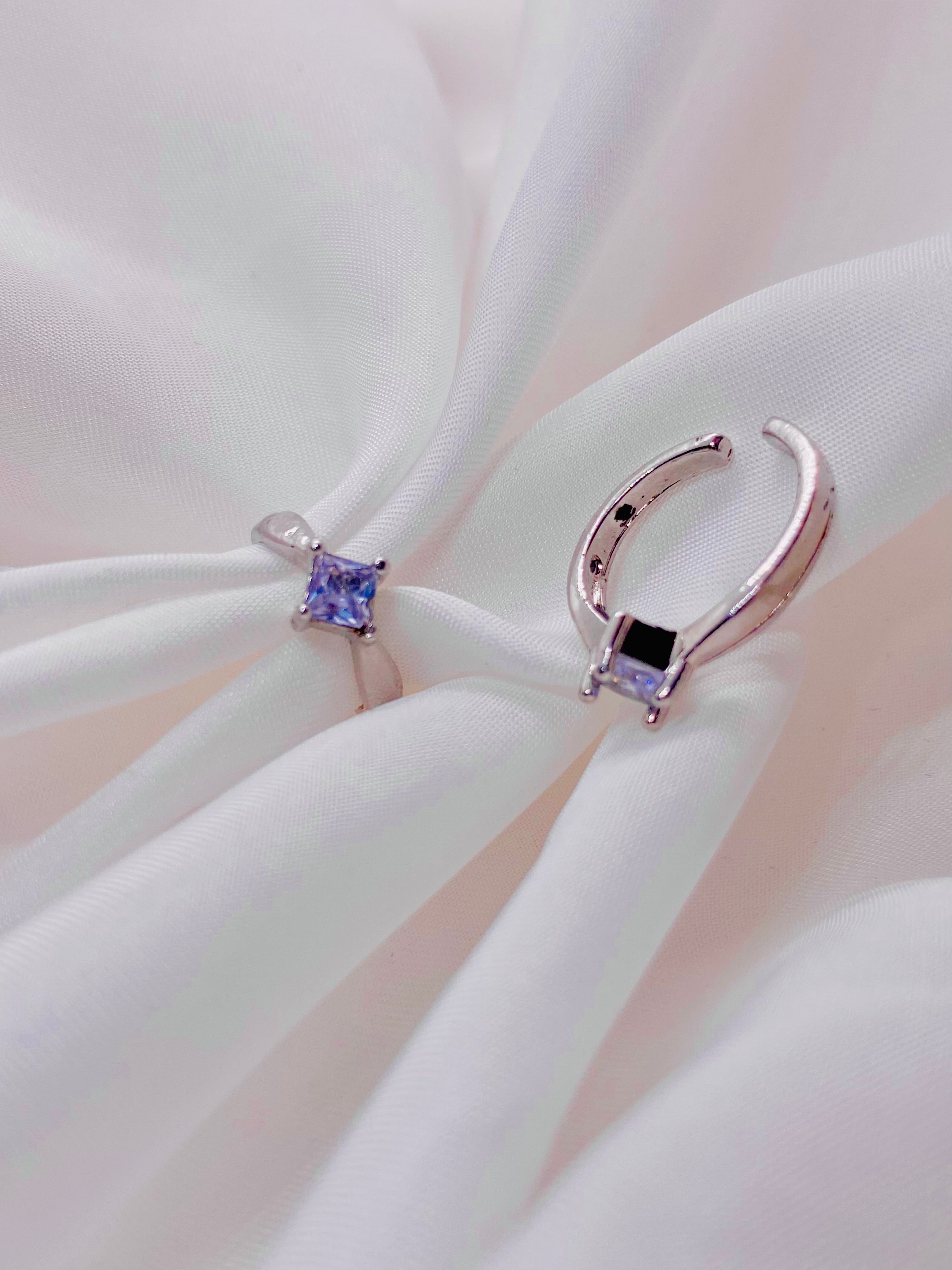 Elegant Dual-Tone Silver Adjustable Rings with Blue Center Stone
