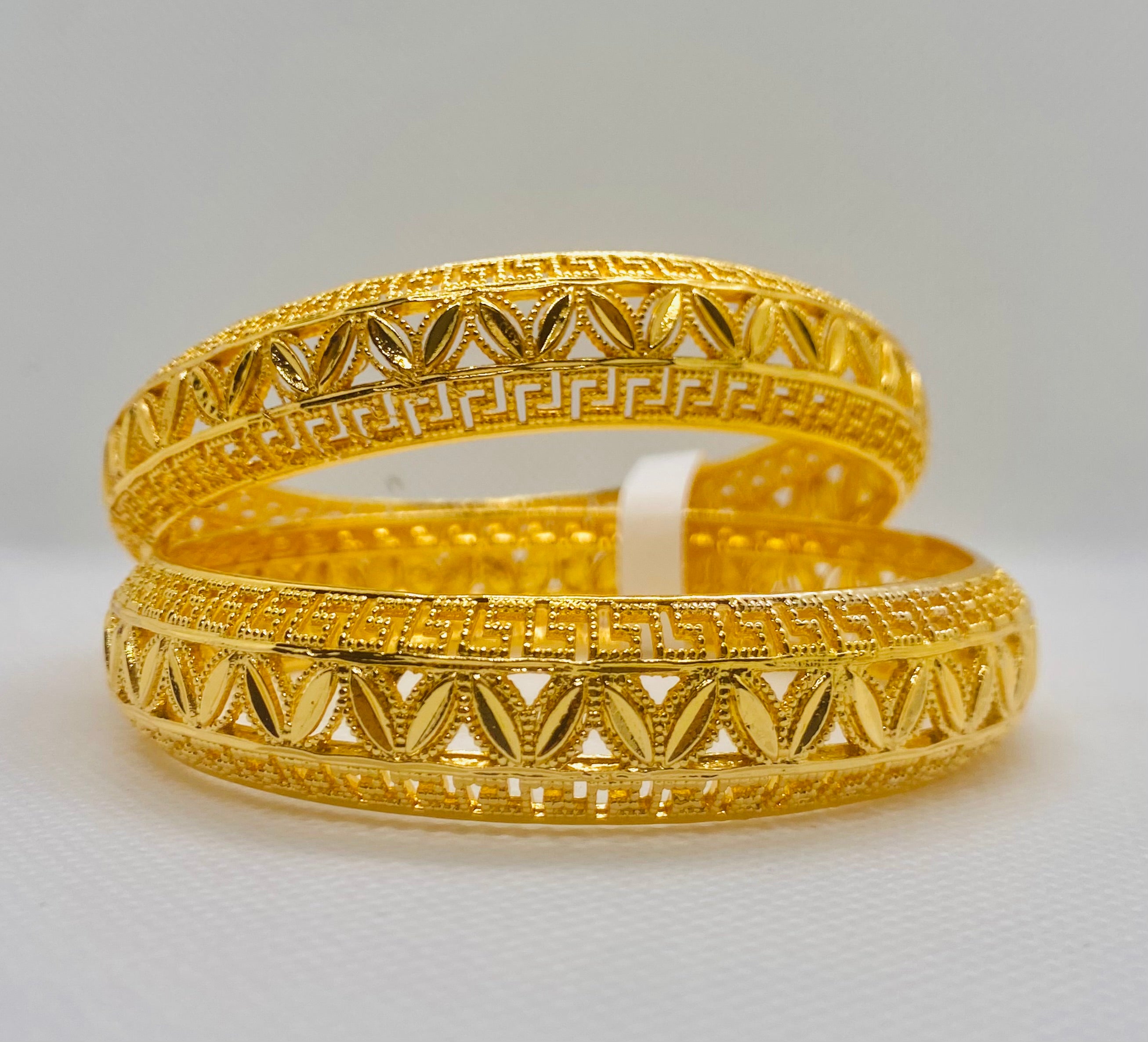 Exquisite Gold Bangles with Intricate Greek Key and Leaf Motif
