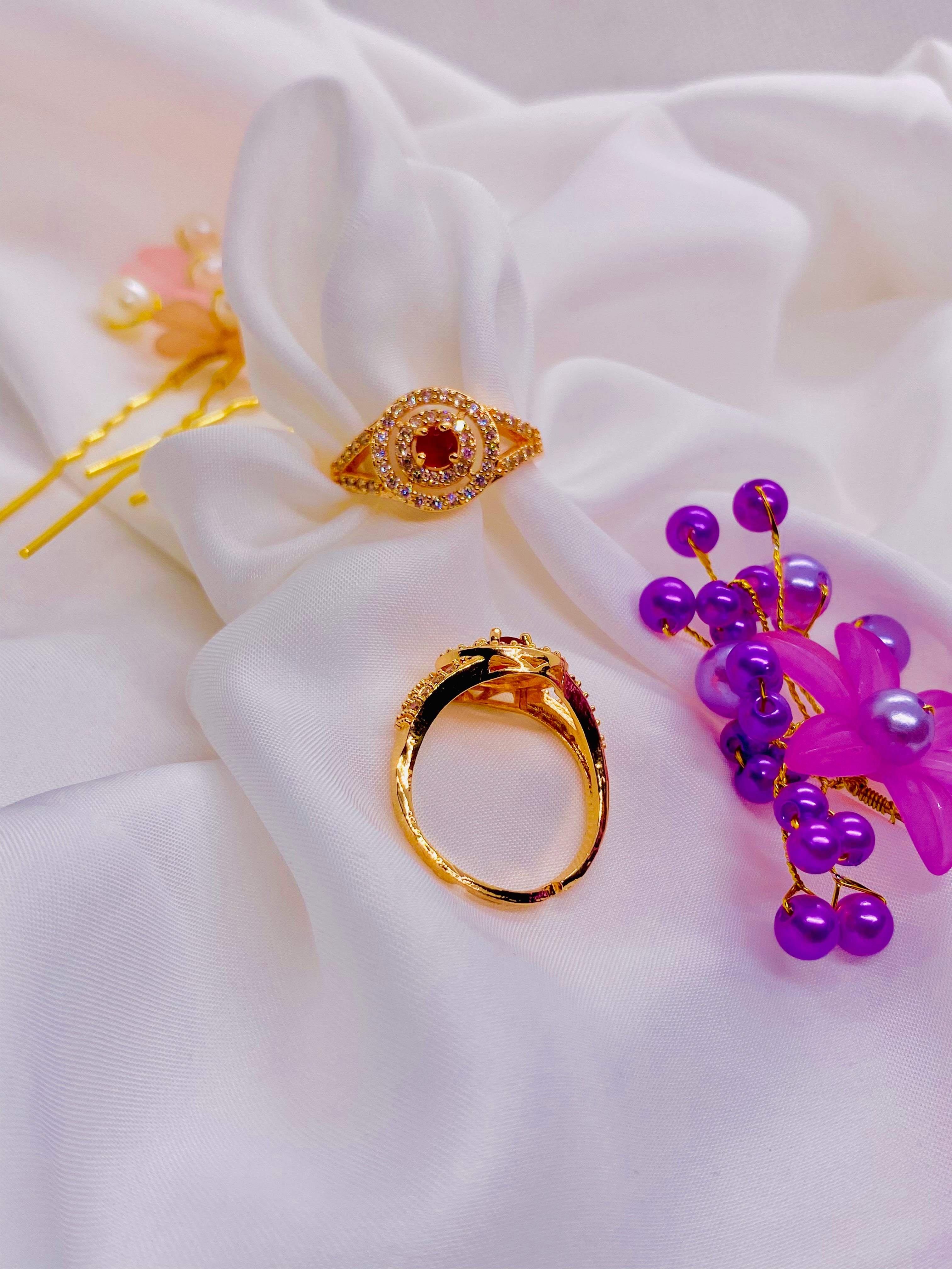 Royal Radiance: Ruby Halo Gold Ring