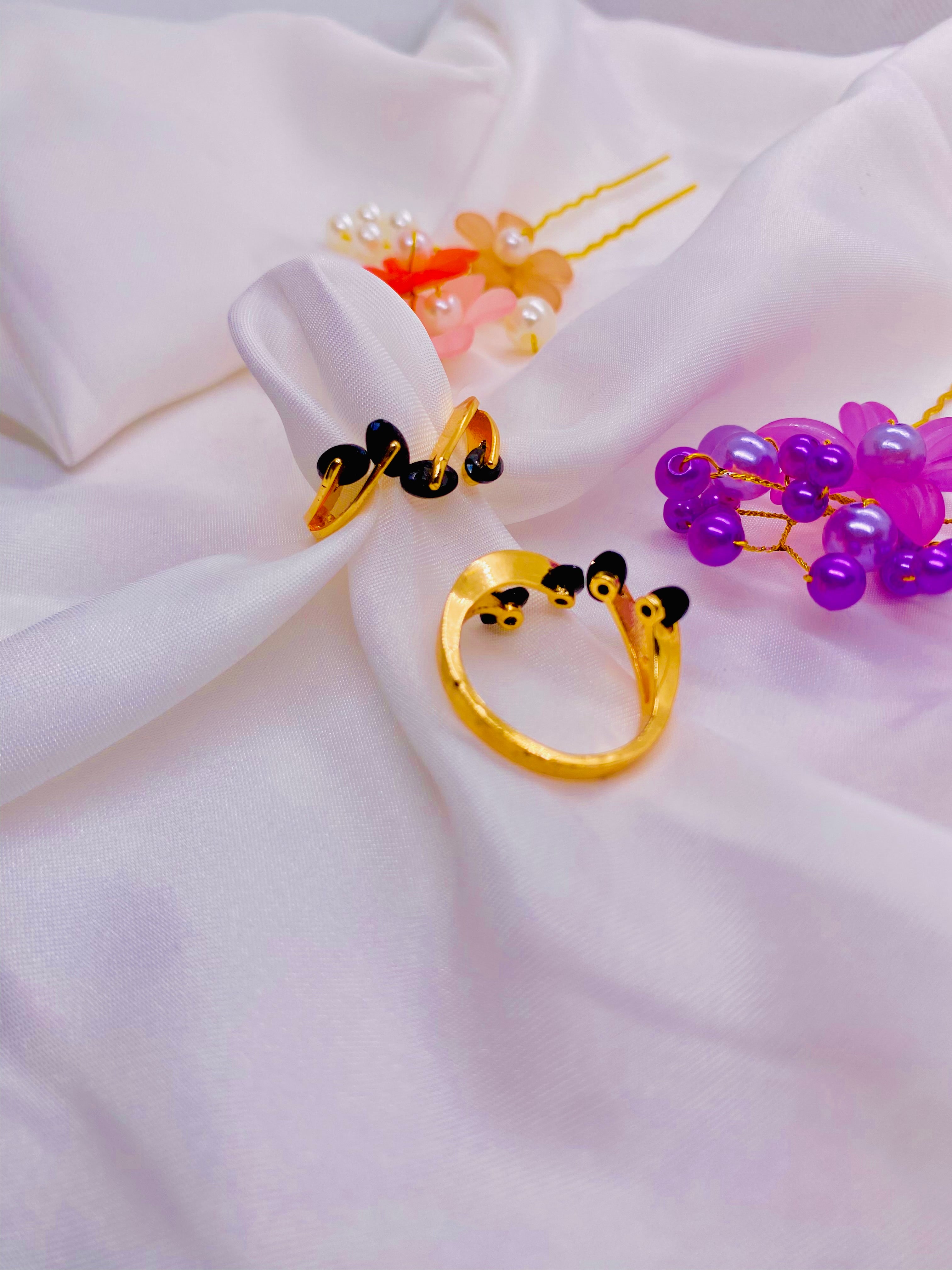 Golden Elegance – Black Heart Accent Rings