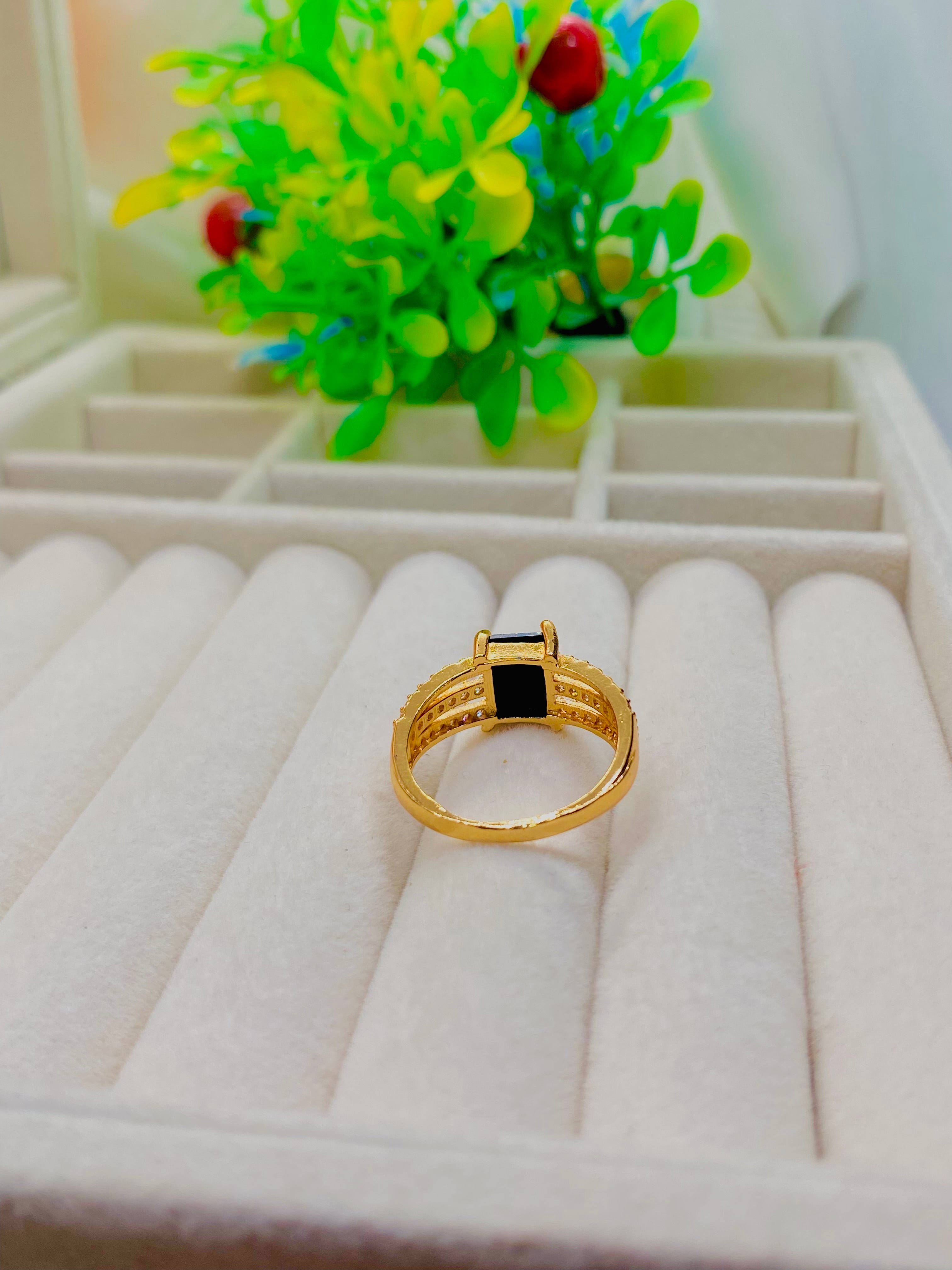 Elegant Gold-Plated Ring with Black Onyx Centerpiece