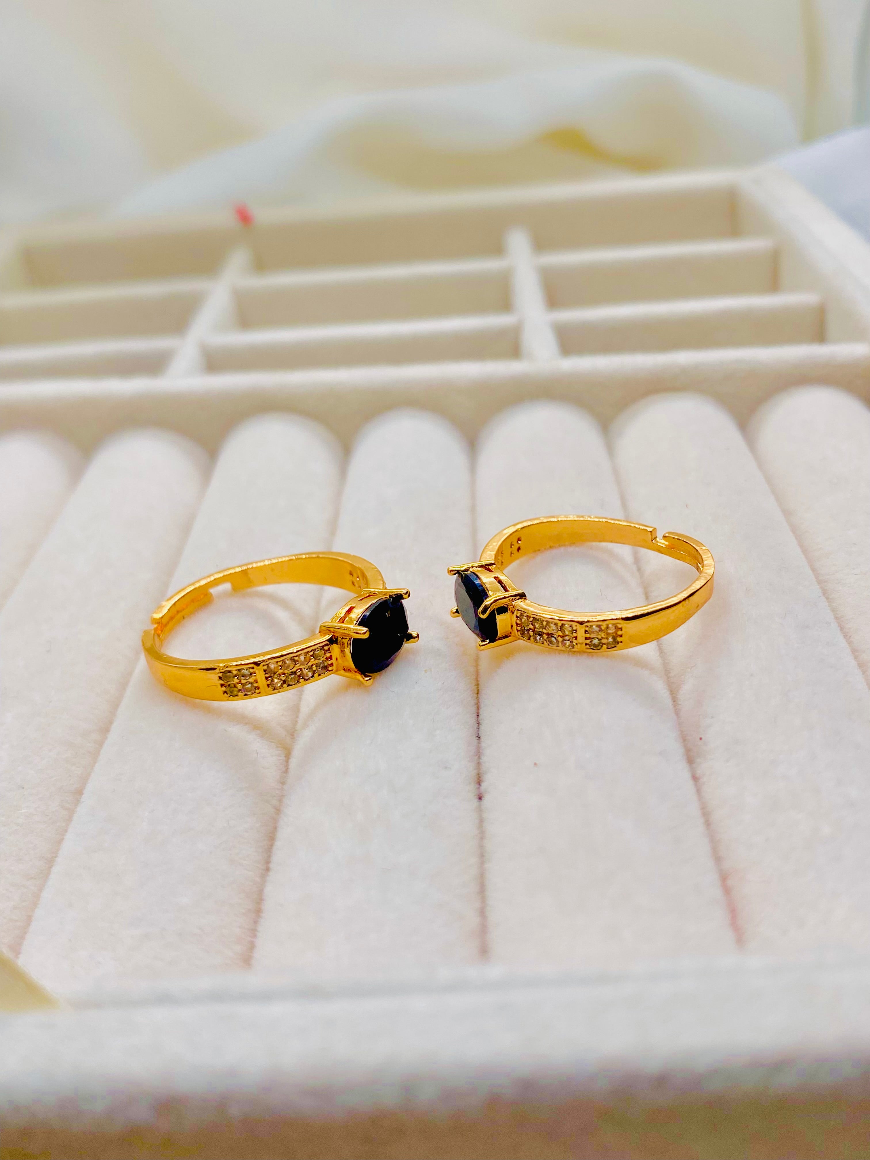 Elegant Gold-Plated Rings with Black Onyx Centerpiece